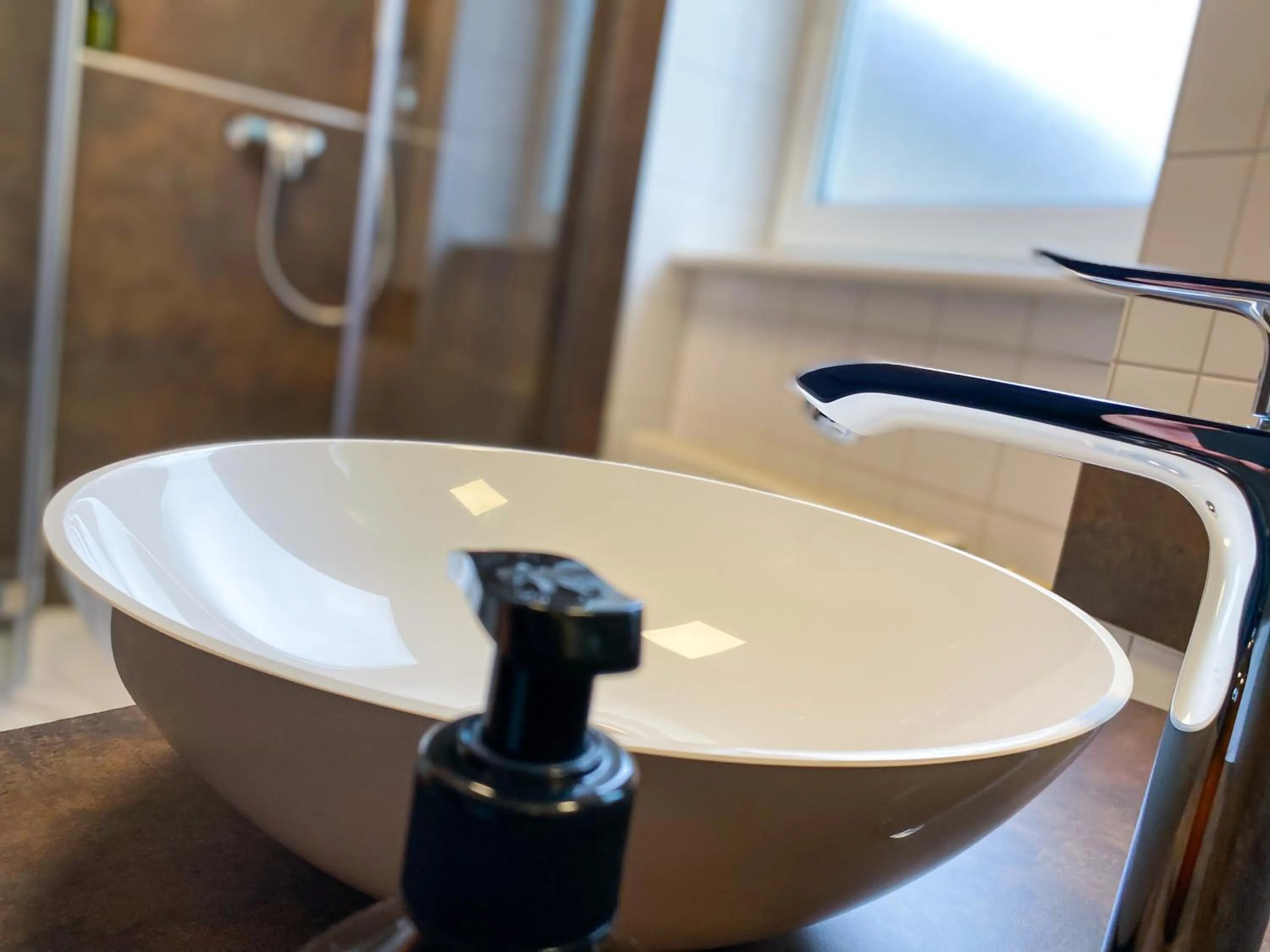 Bathroom in IMPULSIV Hotel & Sportresort