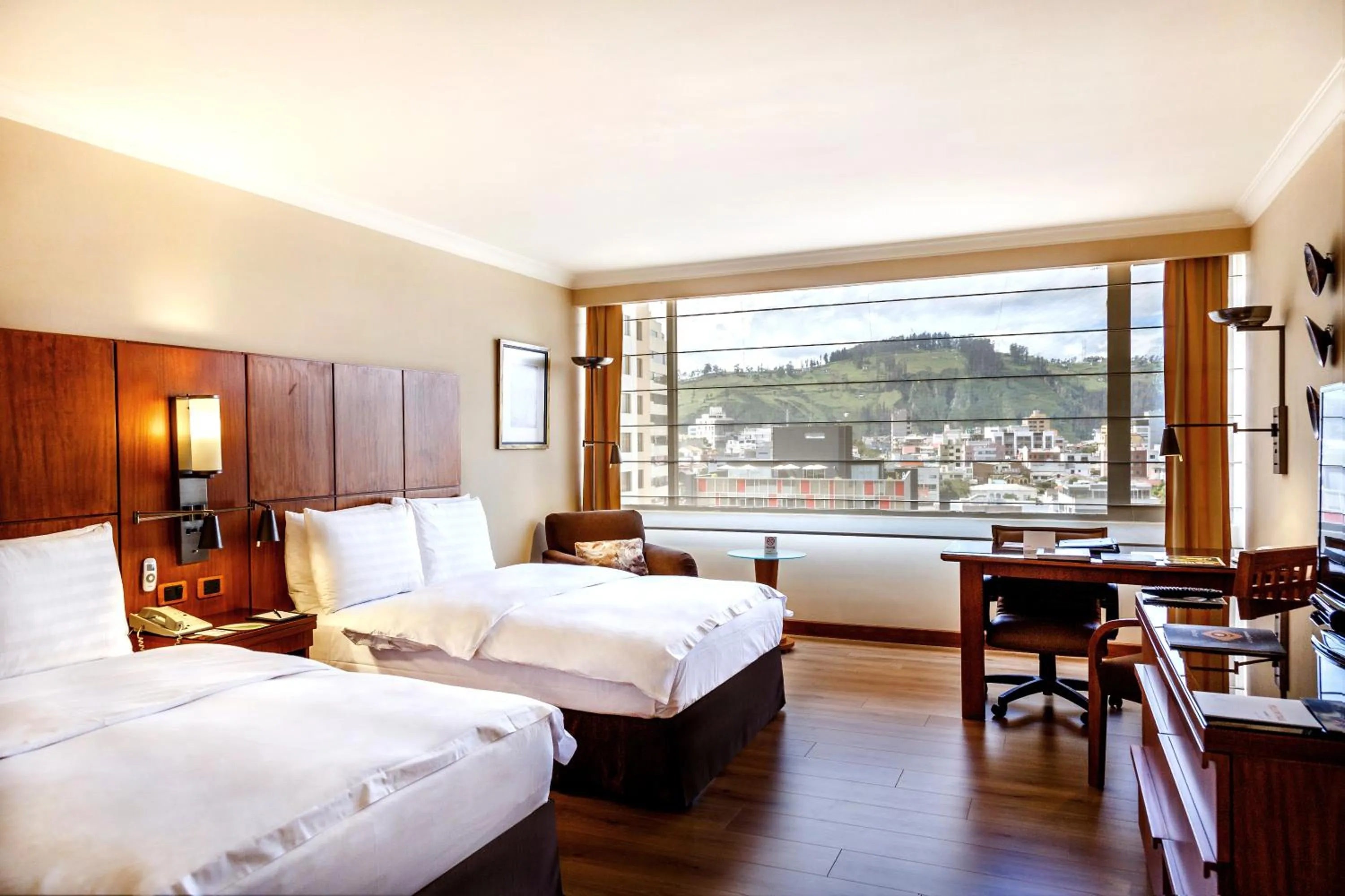 Photo of the whole room, Bed in Swissotel Quito