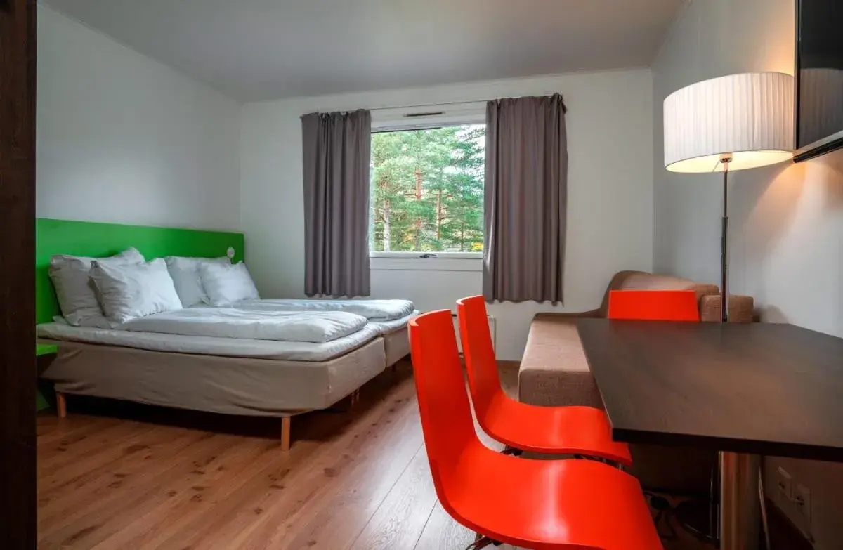 Seating area, Bed in Thon Hotel Bjørneparken Seating area, Bed in Thon Hotel Bjørneparken