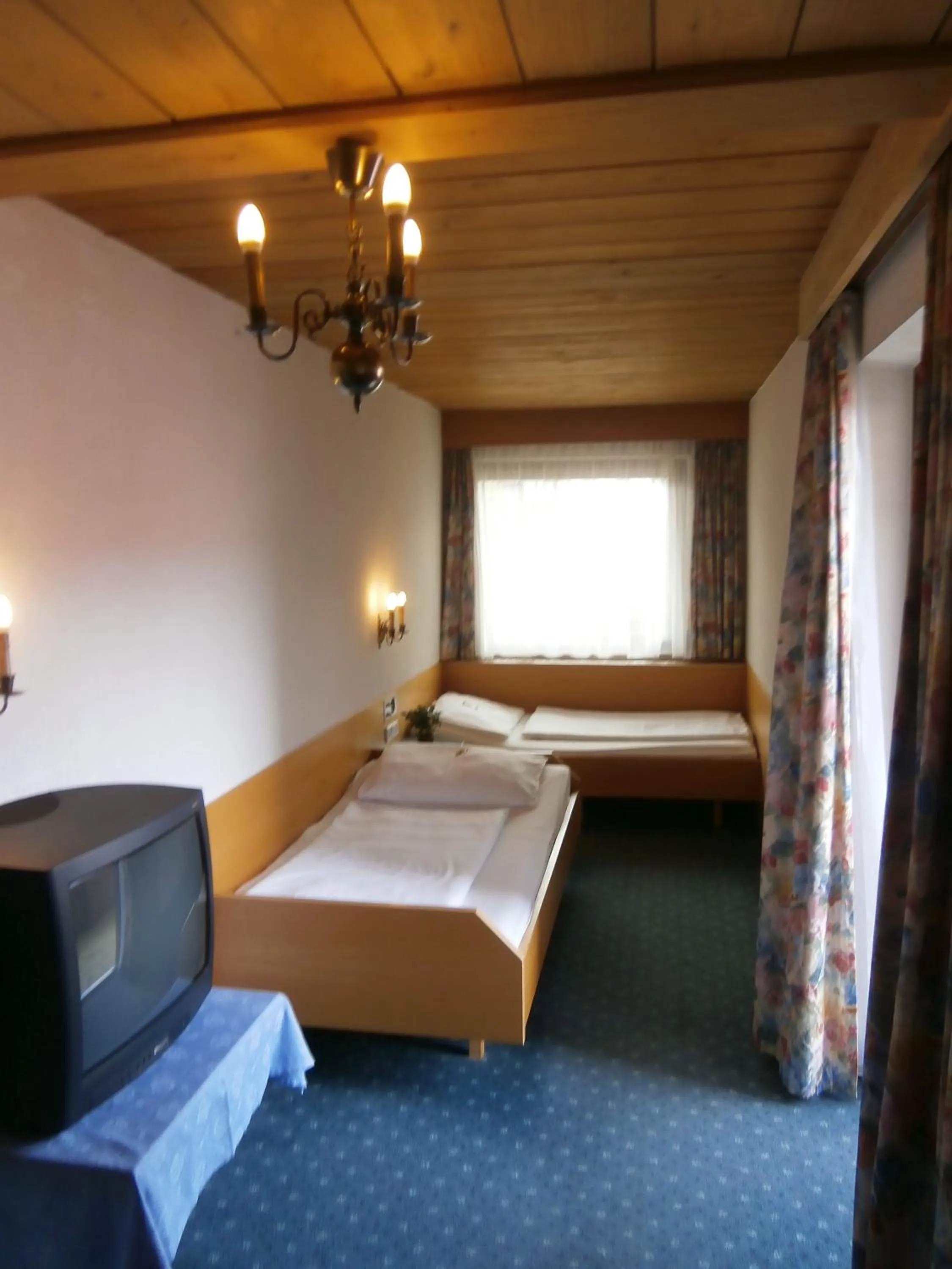 Photo of the whole room, Bed in Das Kaltschmid - Familotel Tirol