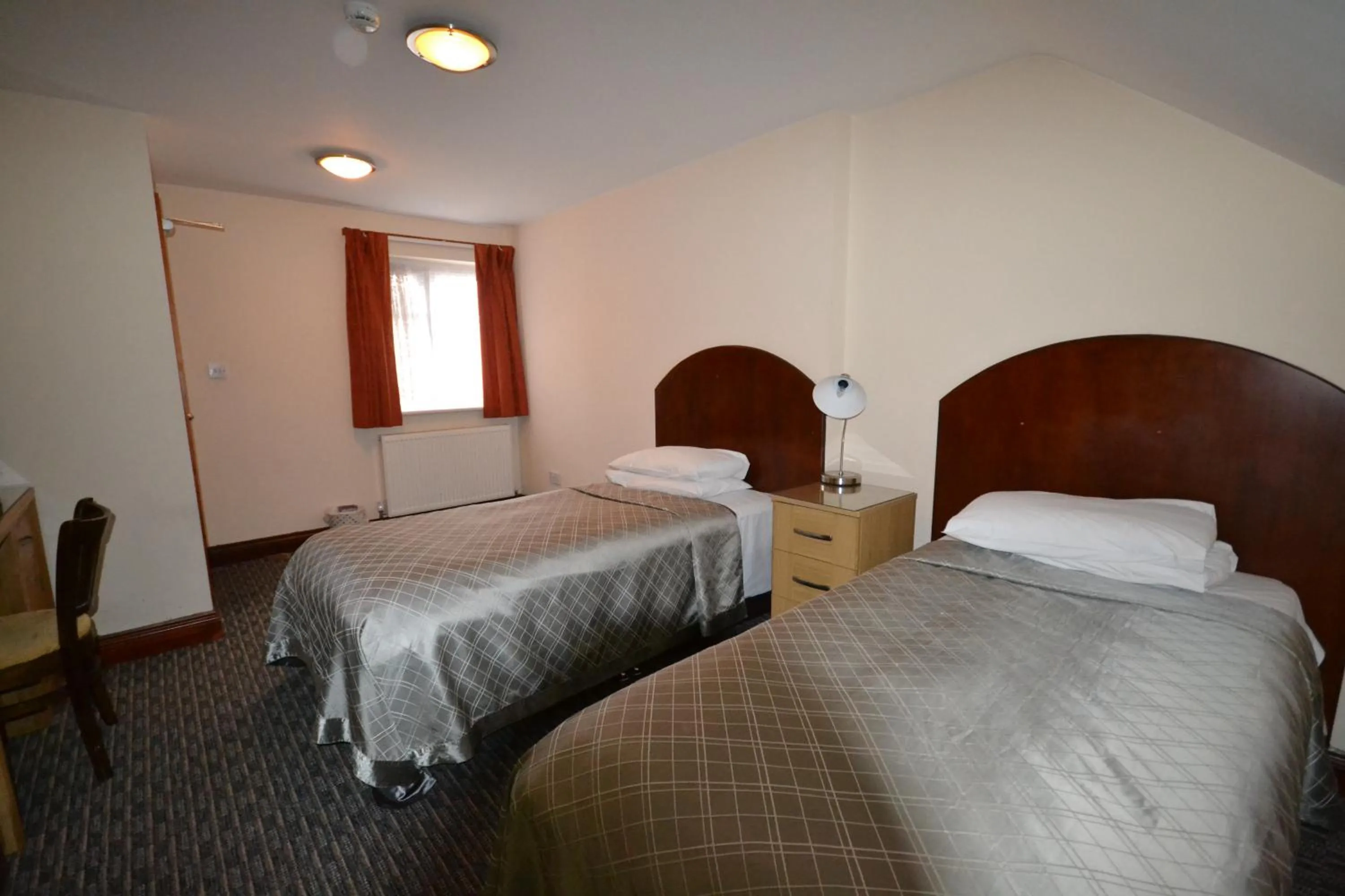 Bed in Airport Guest House