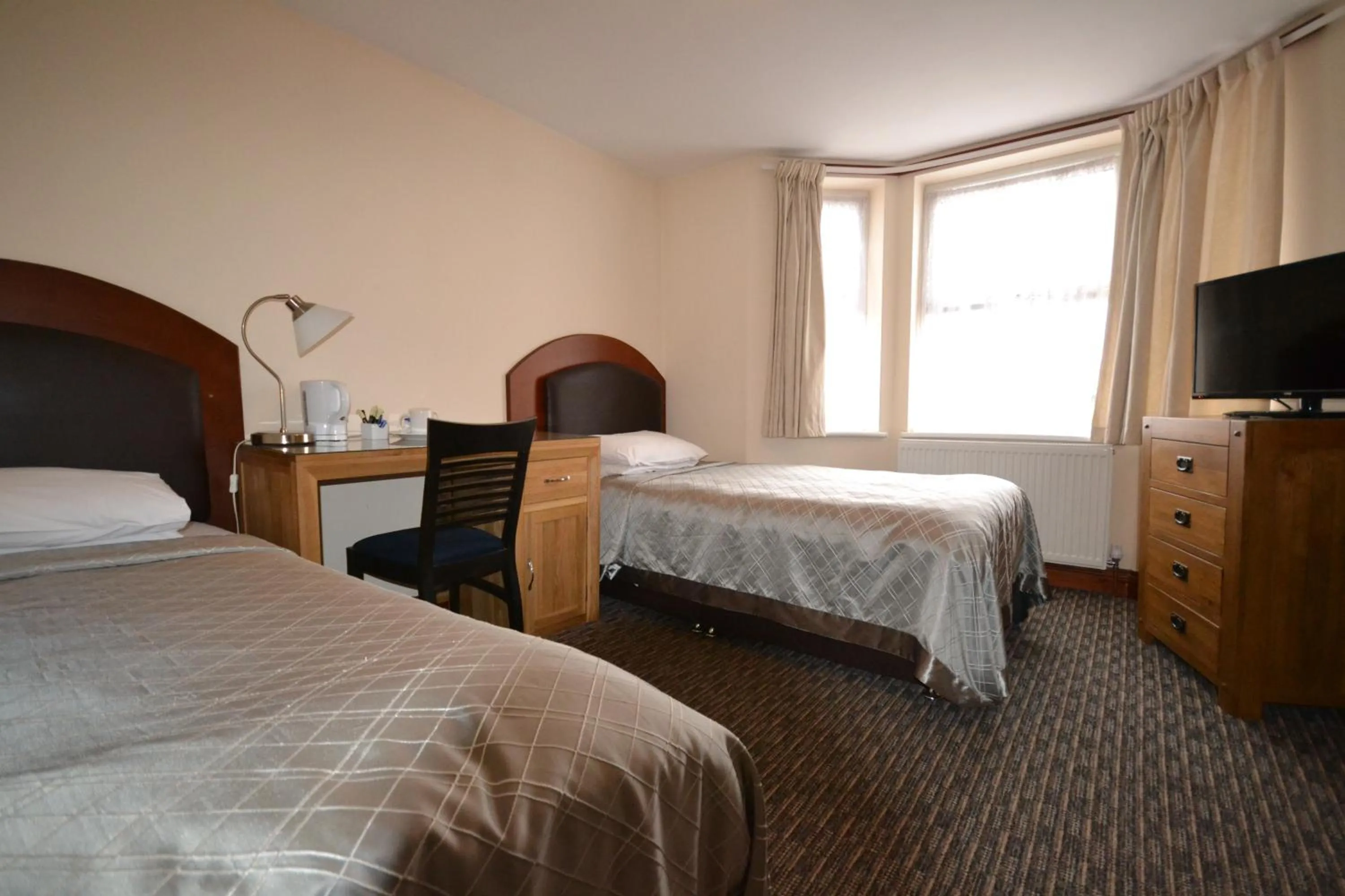 Bed in Airport Guest House