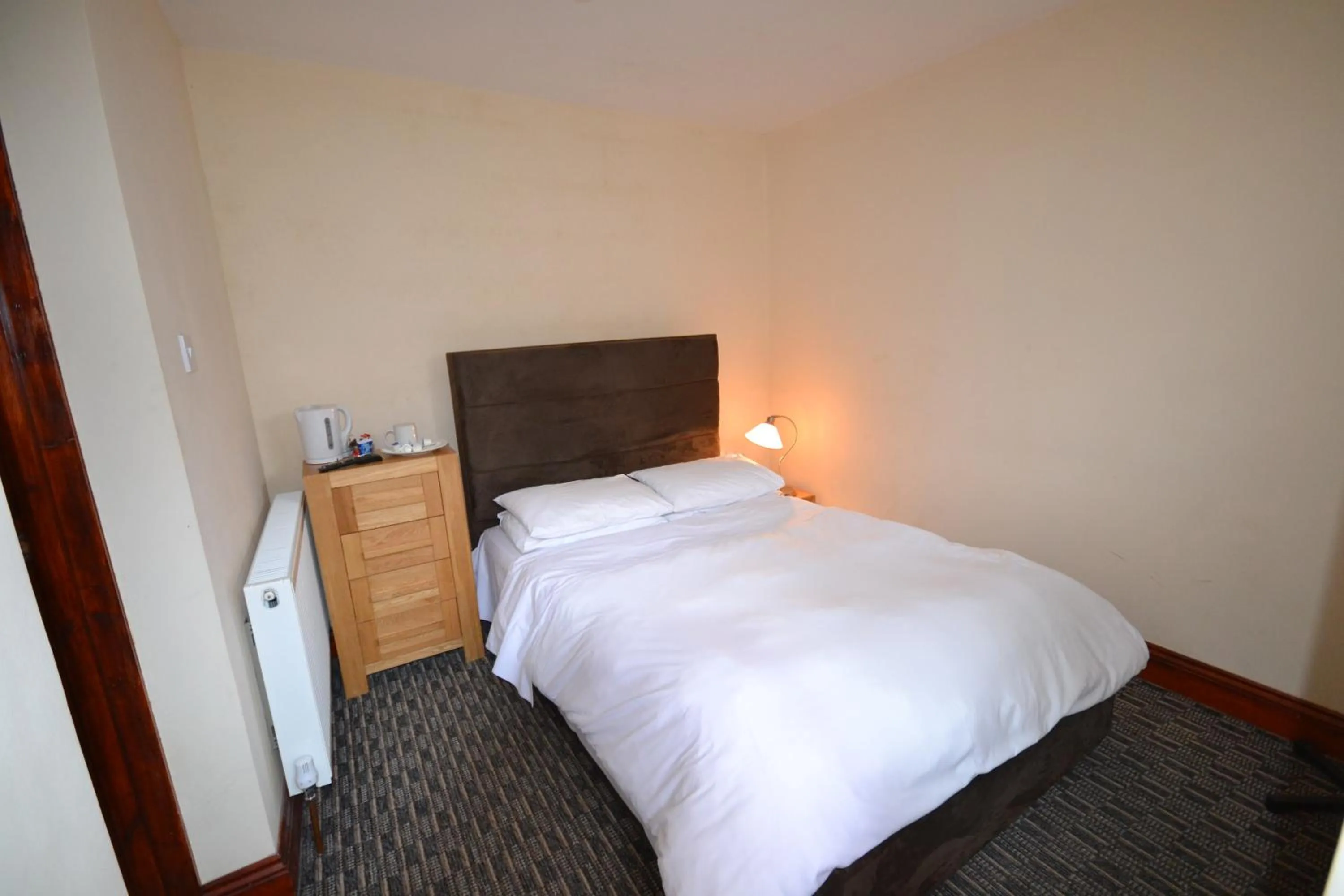 Bed in Airport Guest House