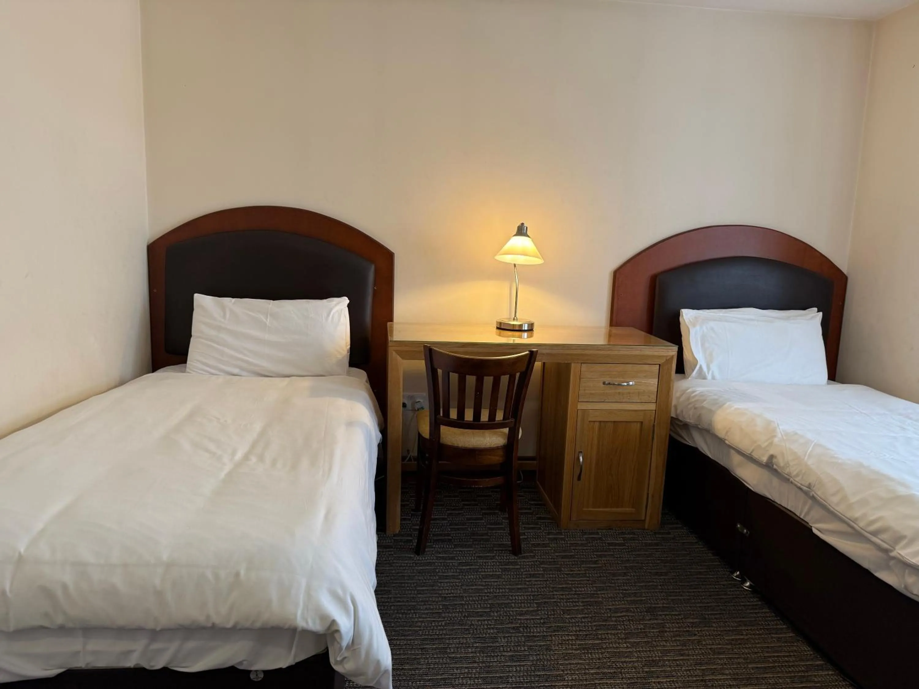 Bed in Airport Guest House