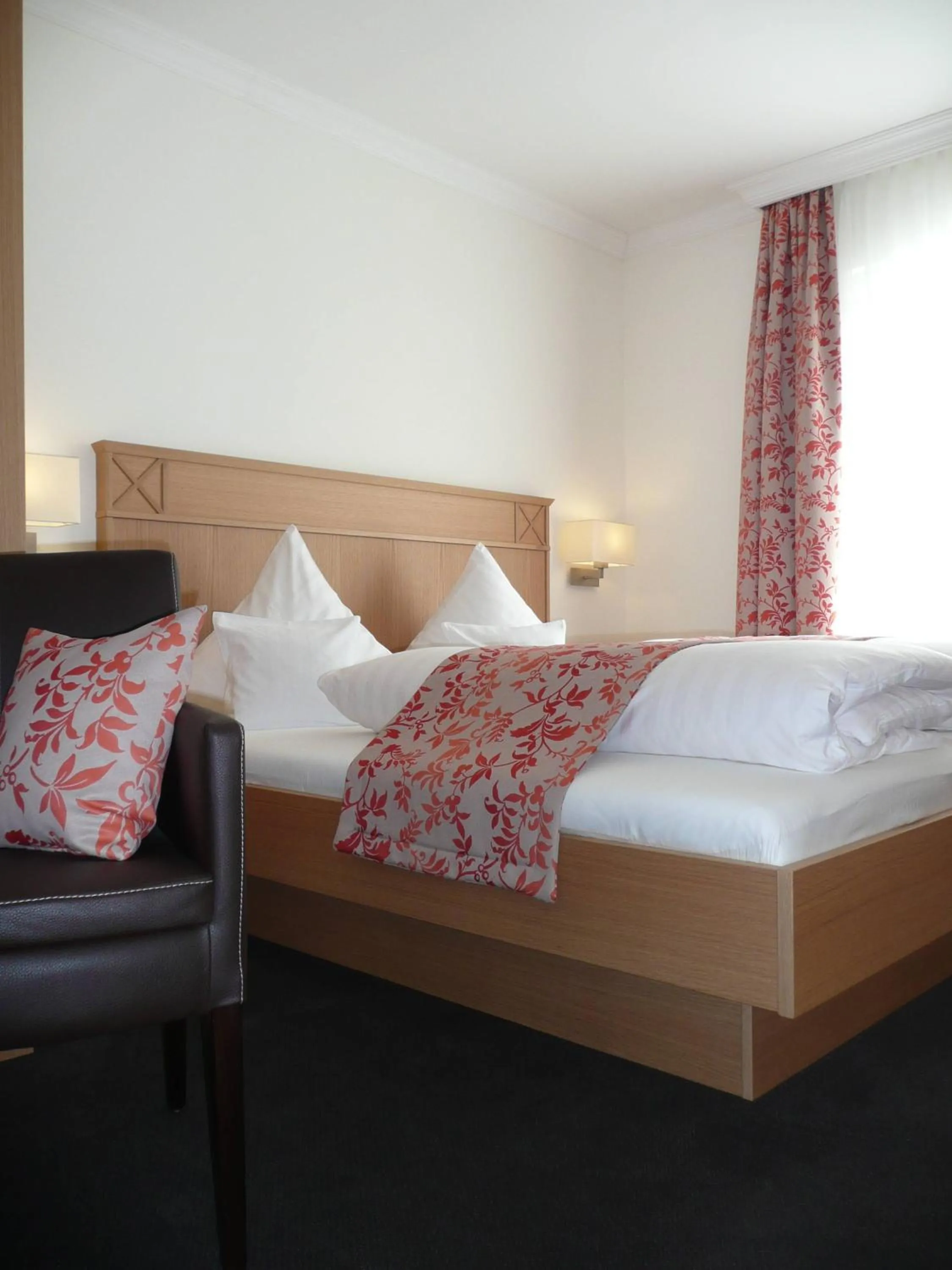 Bed in Hotel Garni Rheinpracht