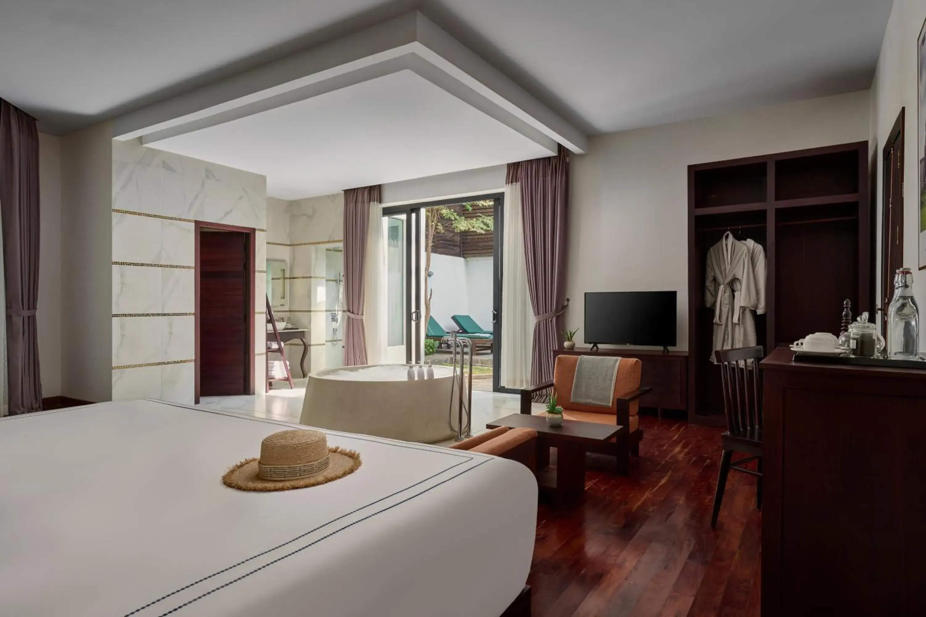 TV and multimedia, Bed in The Embassy Angkor Resort & Spa TV and multimedia, Bed in The Embassy Angkor Resort & Spa