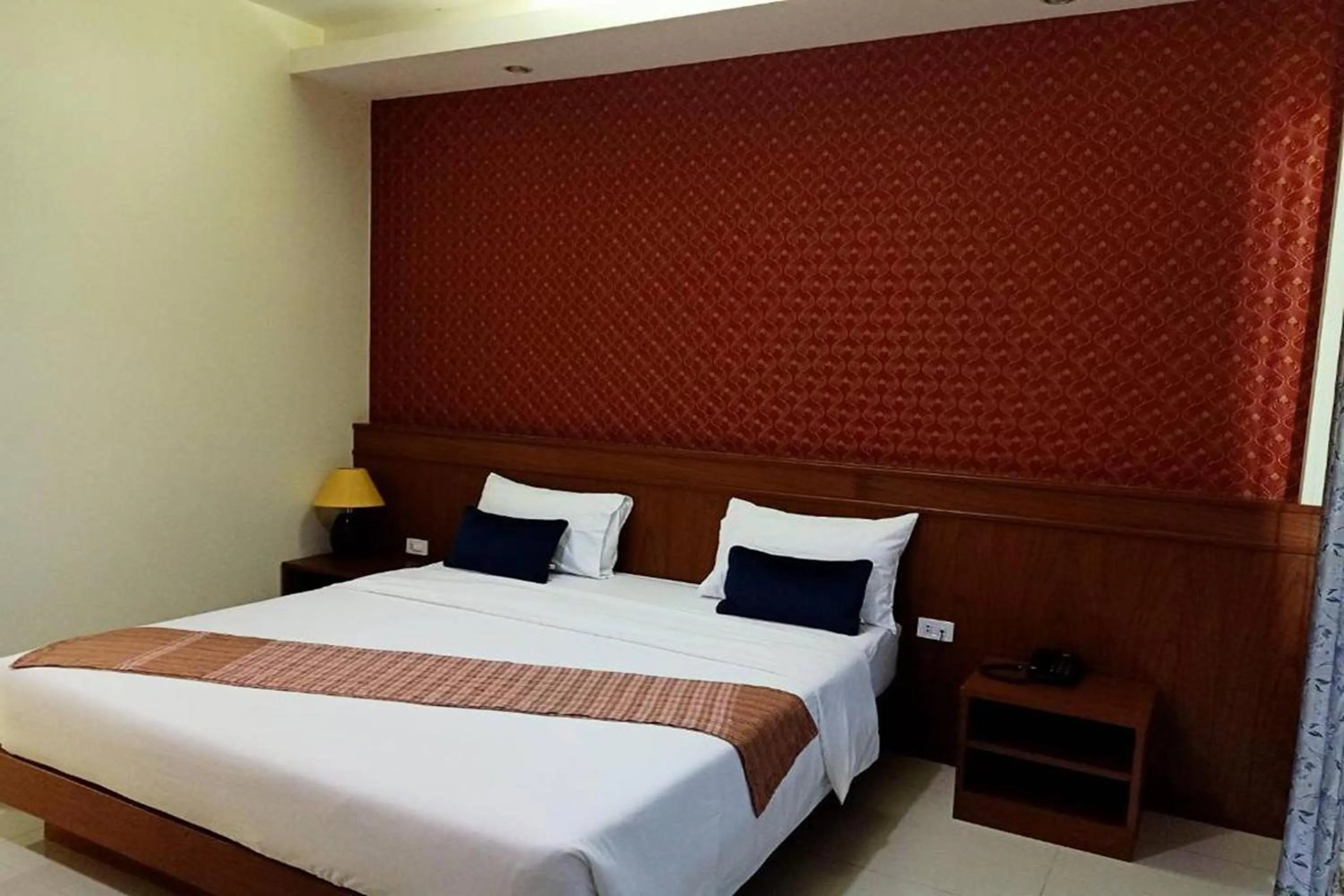 Bed in Karnmanee Place Hotel