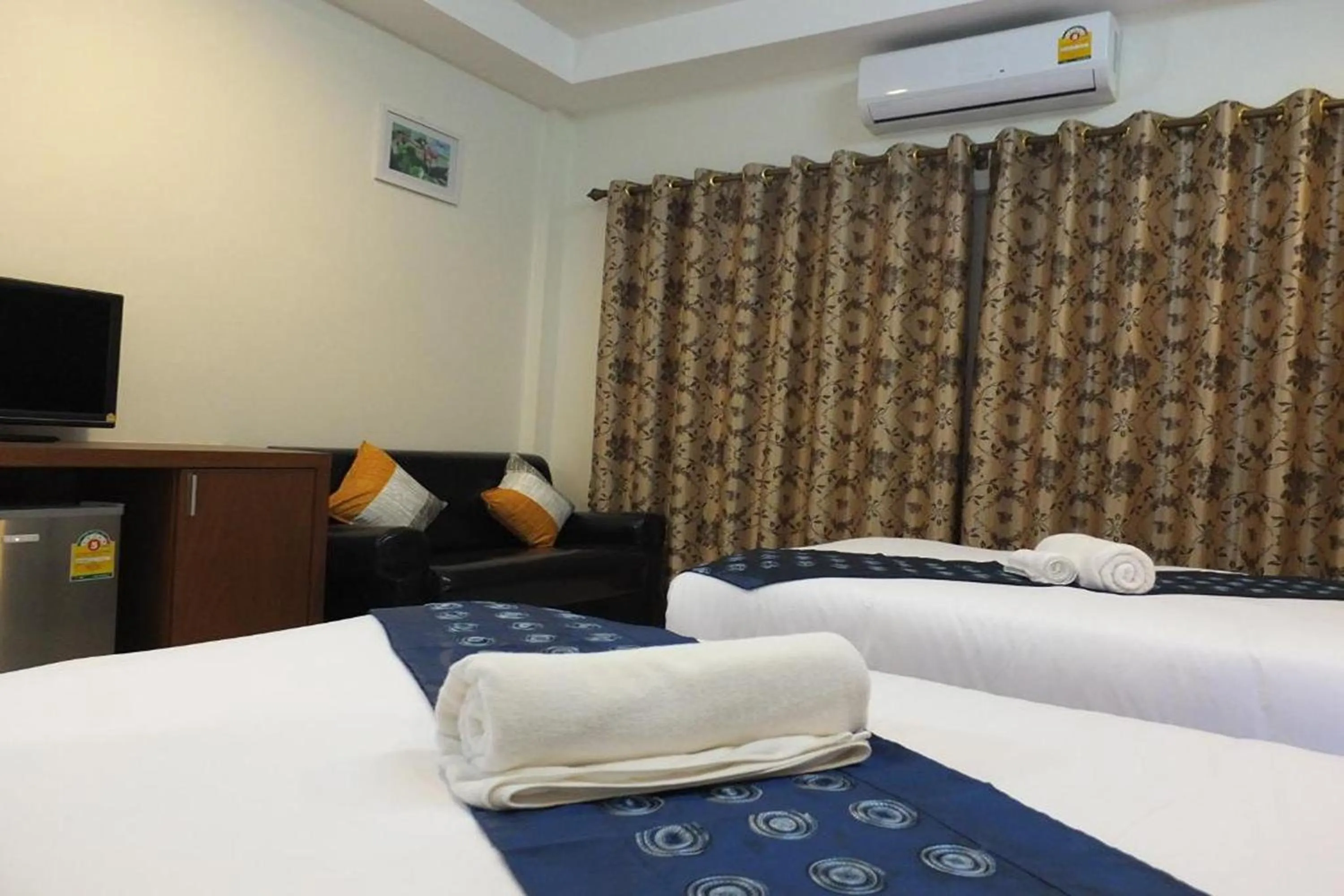 Bed in Karnmanee Place Hotel