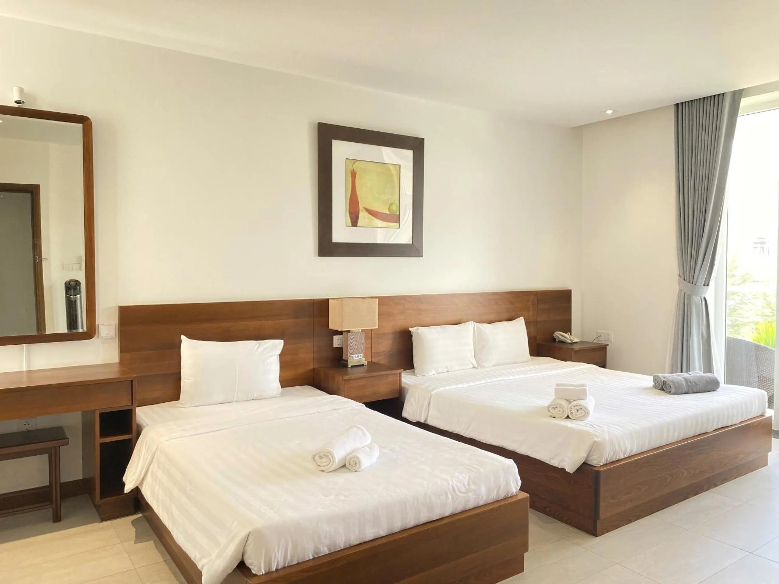 Bed in Qli Hotel Muine