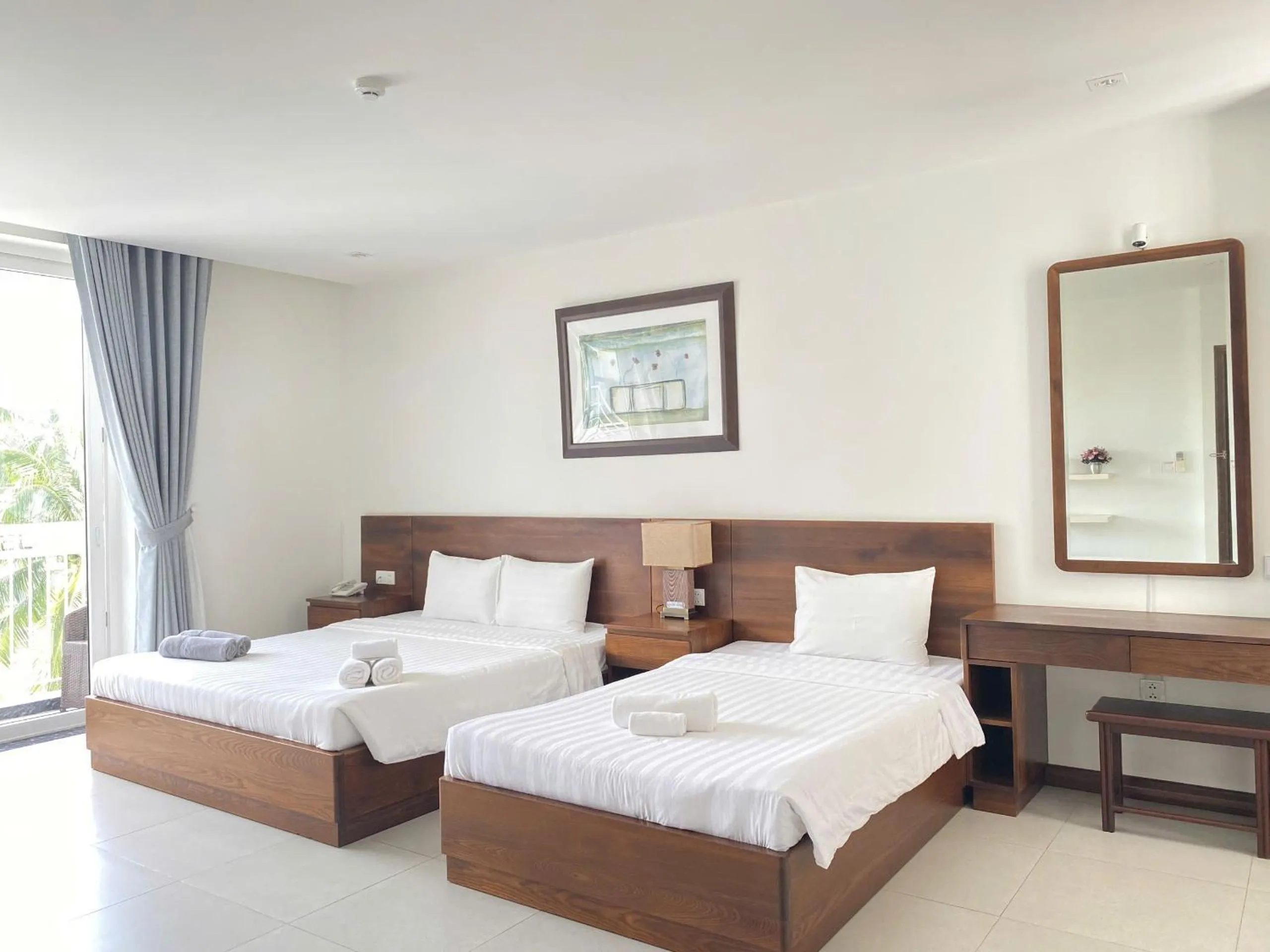 Bed in Qli Hotel Muine