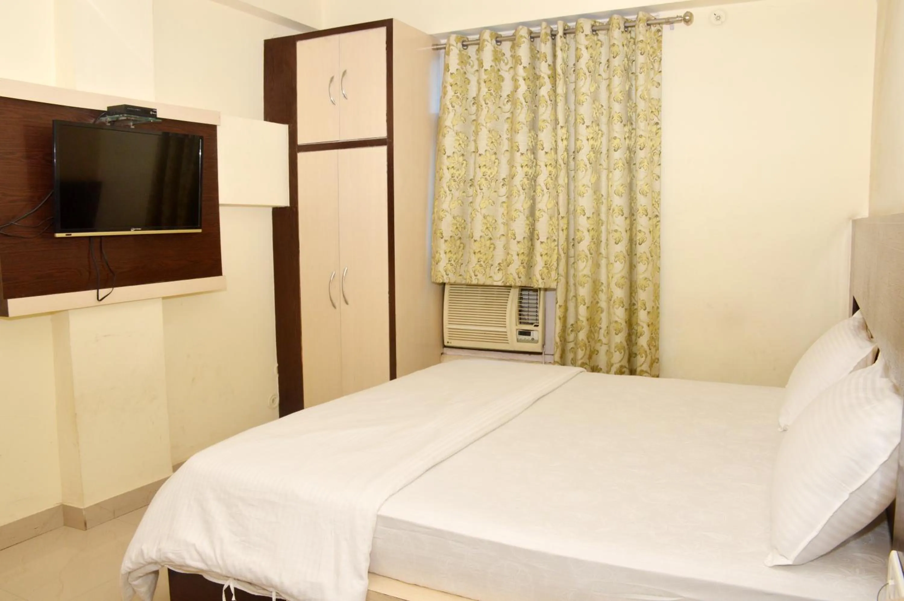 Bed in Hotel Nand Residency