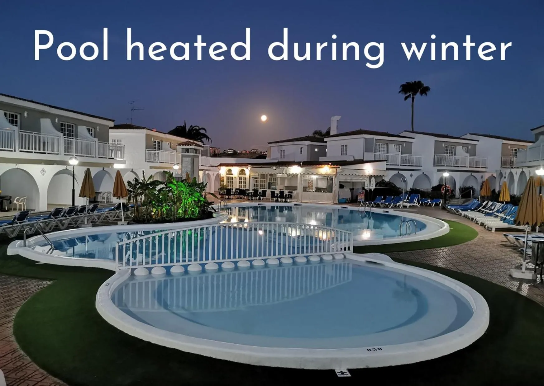 Pool view in Bungalows Parque Nogal