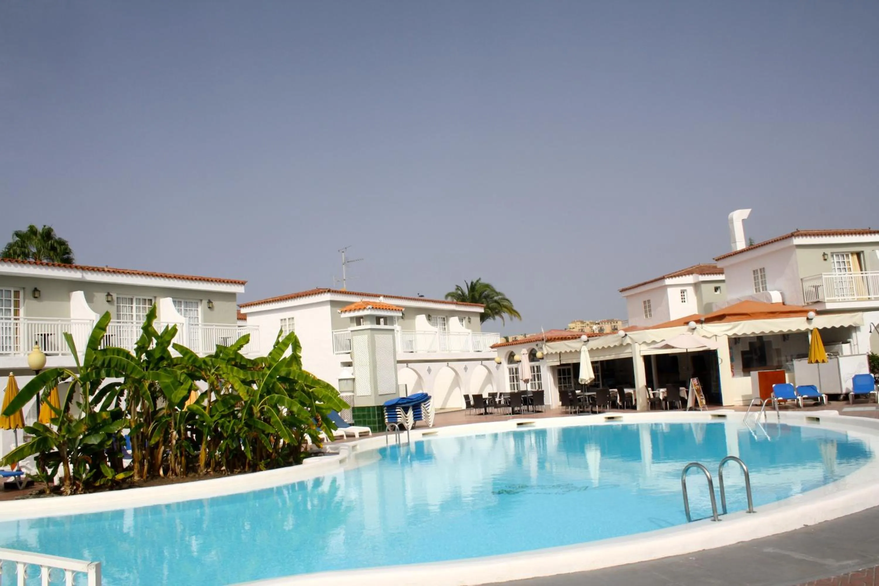 Pool view in Bungalows Parque Nogal