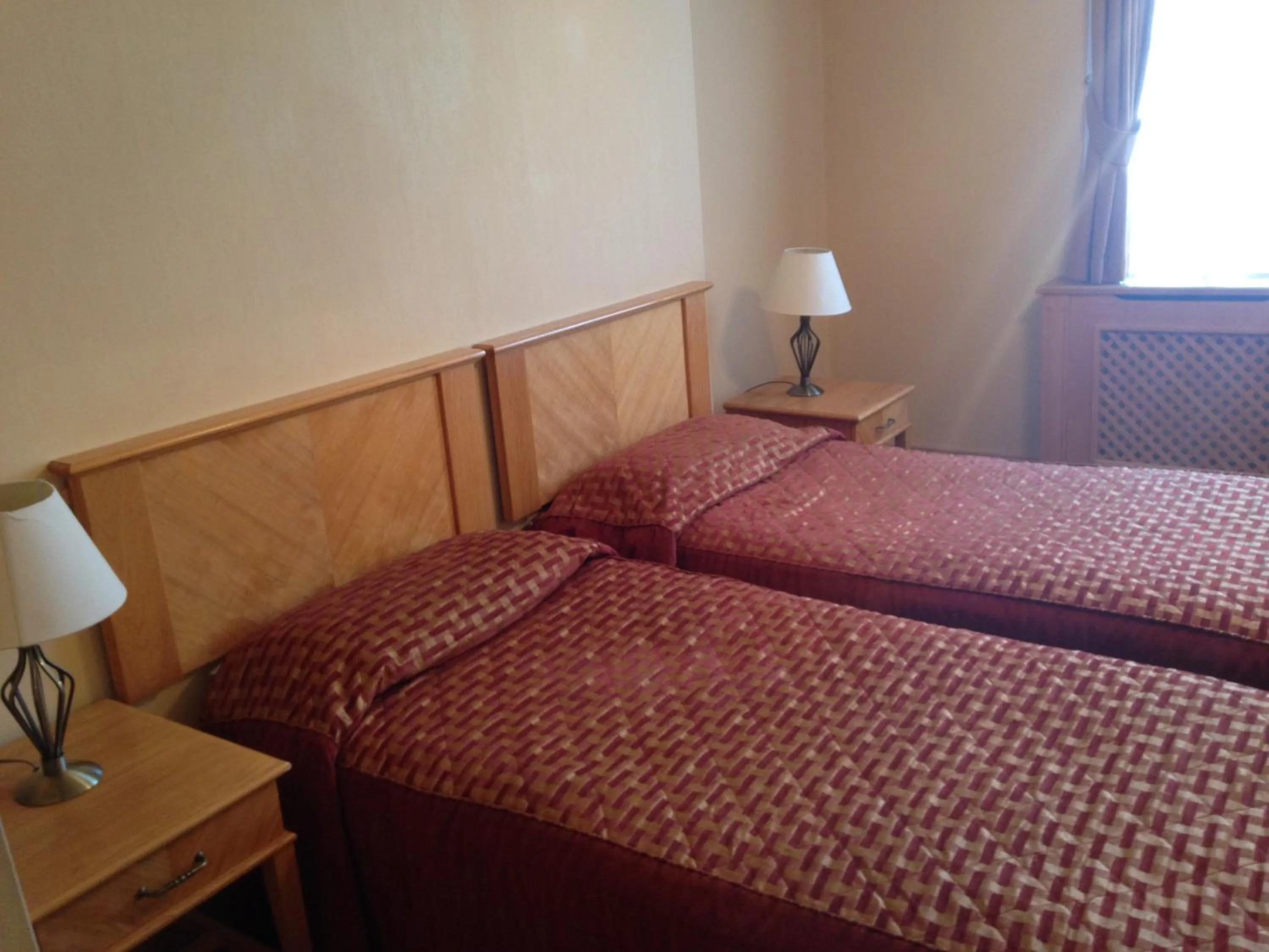 Photo of the whole room, Bed in Troy Hotel