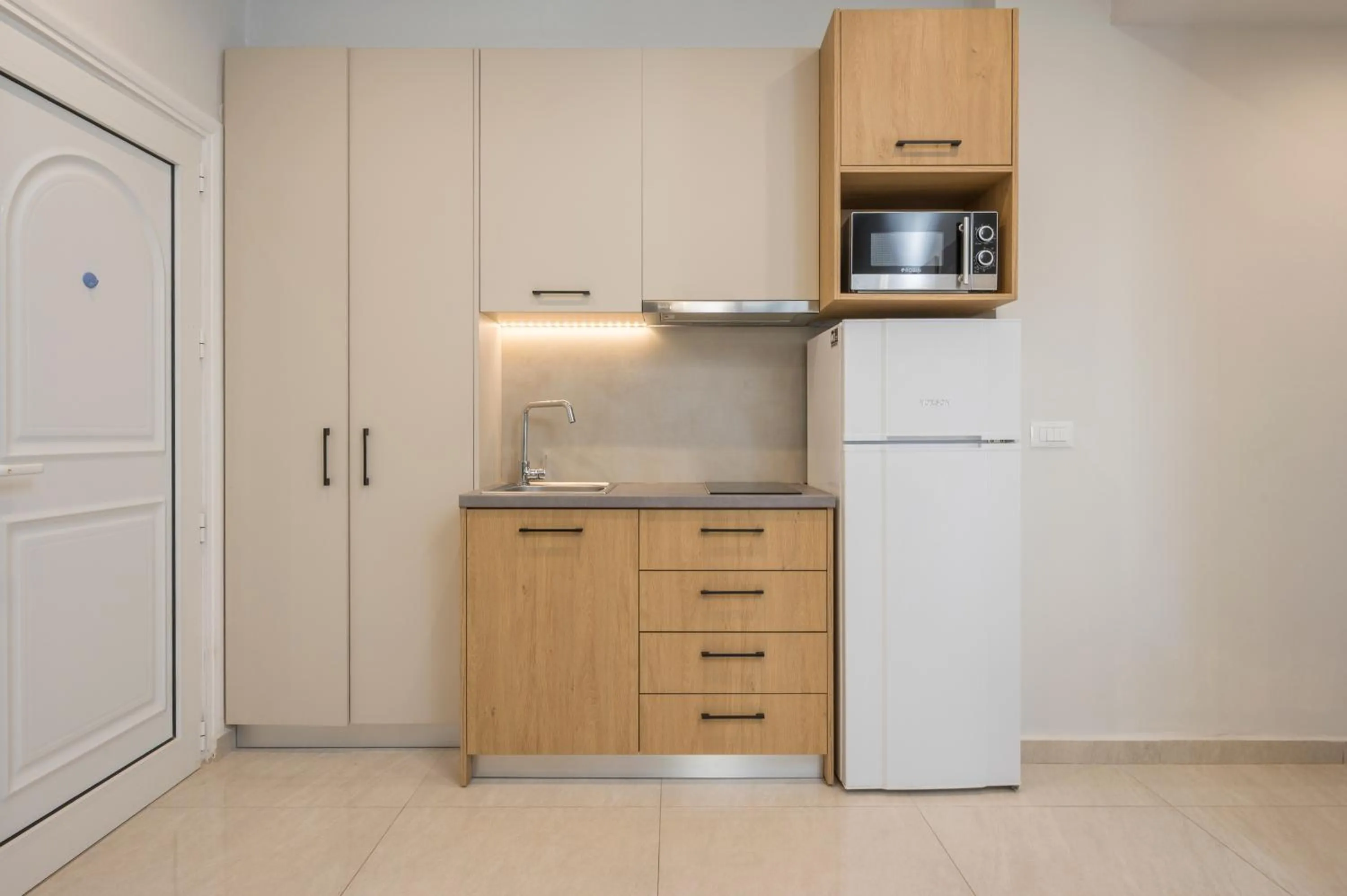 Kitchen or kitchenette in Esplanade Apartments - Heated Pool