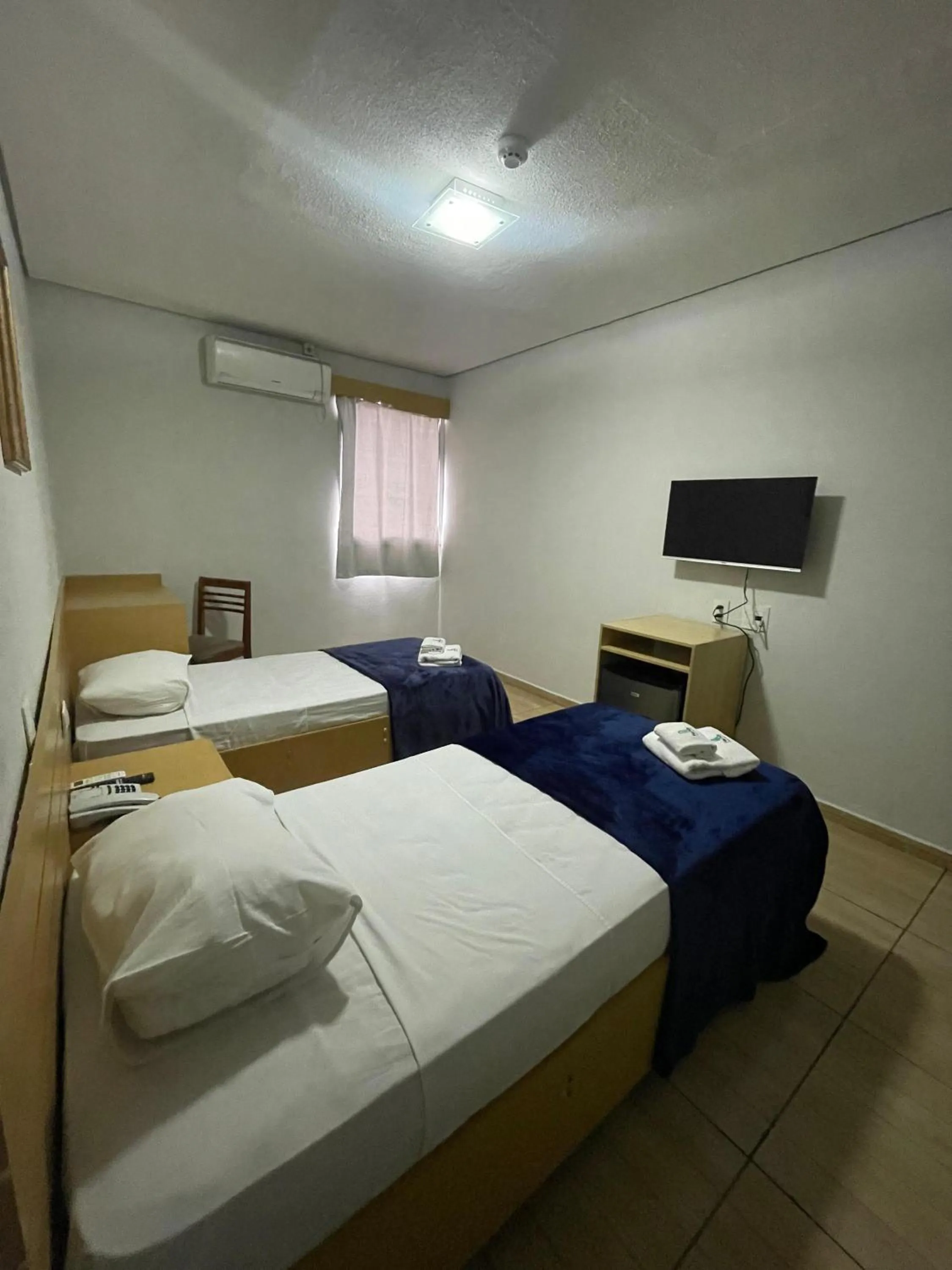 Photo of the whole room, Bed in Hotel Family São Paulo - No Shopping FAMILY - No Brás