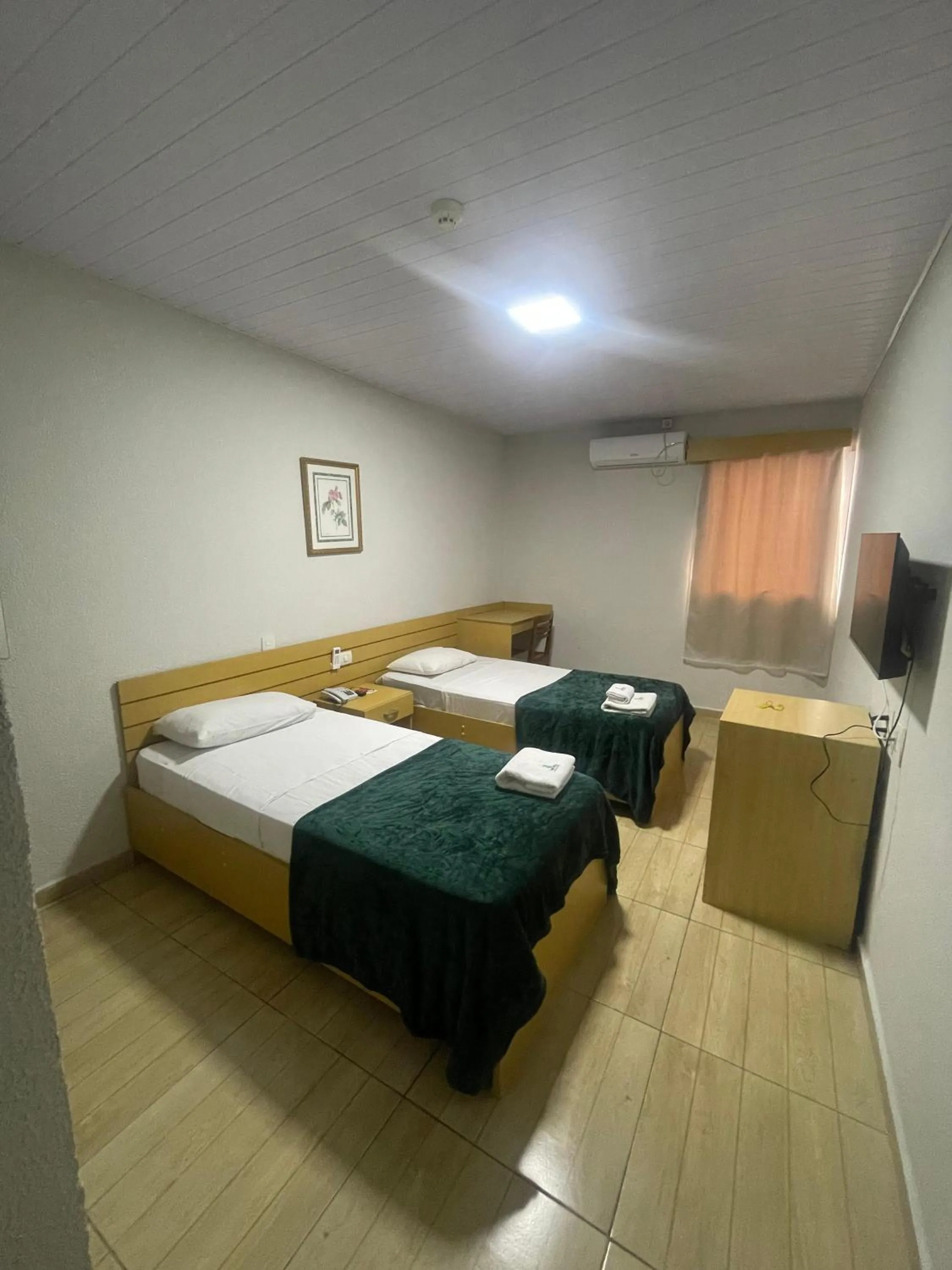 Photo of the whole room, Bed in Hotel Family São Paulo - No Shopping FAMILY - No Brás