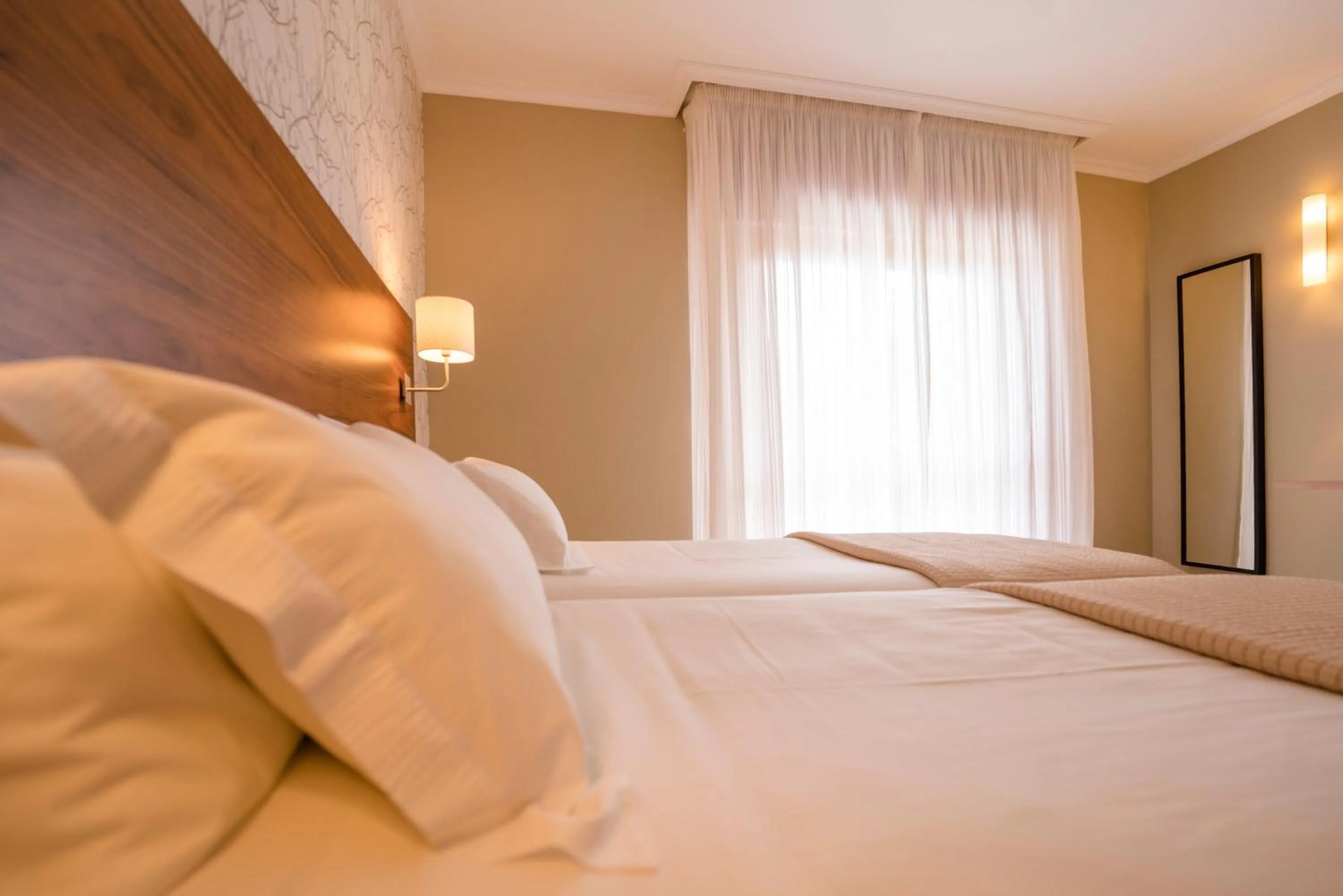 Bed in Hotel Piramide