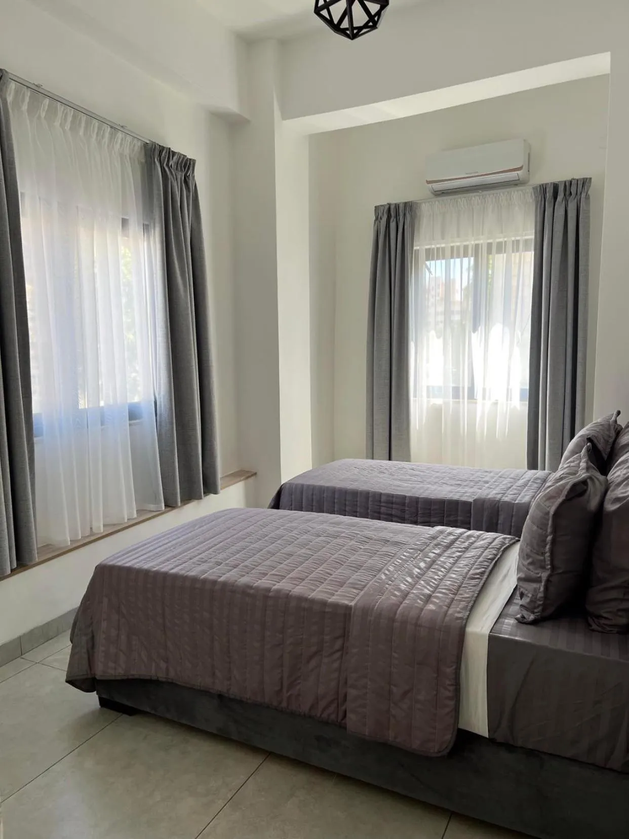 Bed in Jordan Tower Hotel