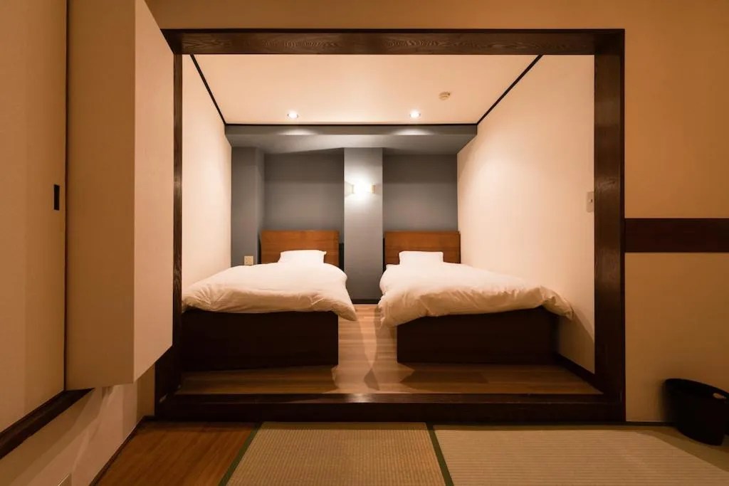 Bed in Tokyo Guest House Ouji Music Lounge