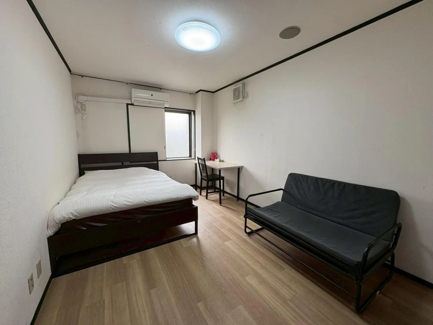 Bed in Tokyo Guest House Ouji Music Lounge