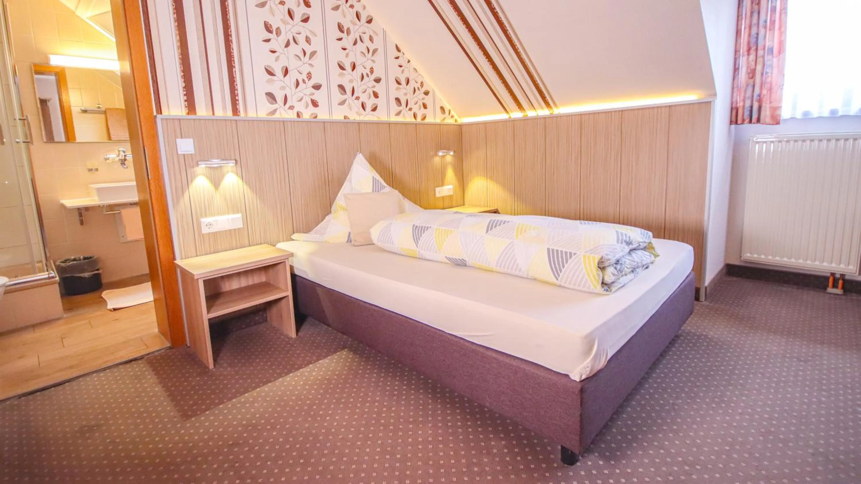 Photo of the whole room, Bed in Hotel Fausel