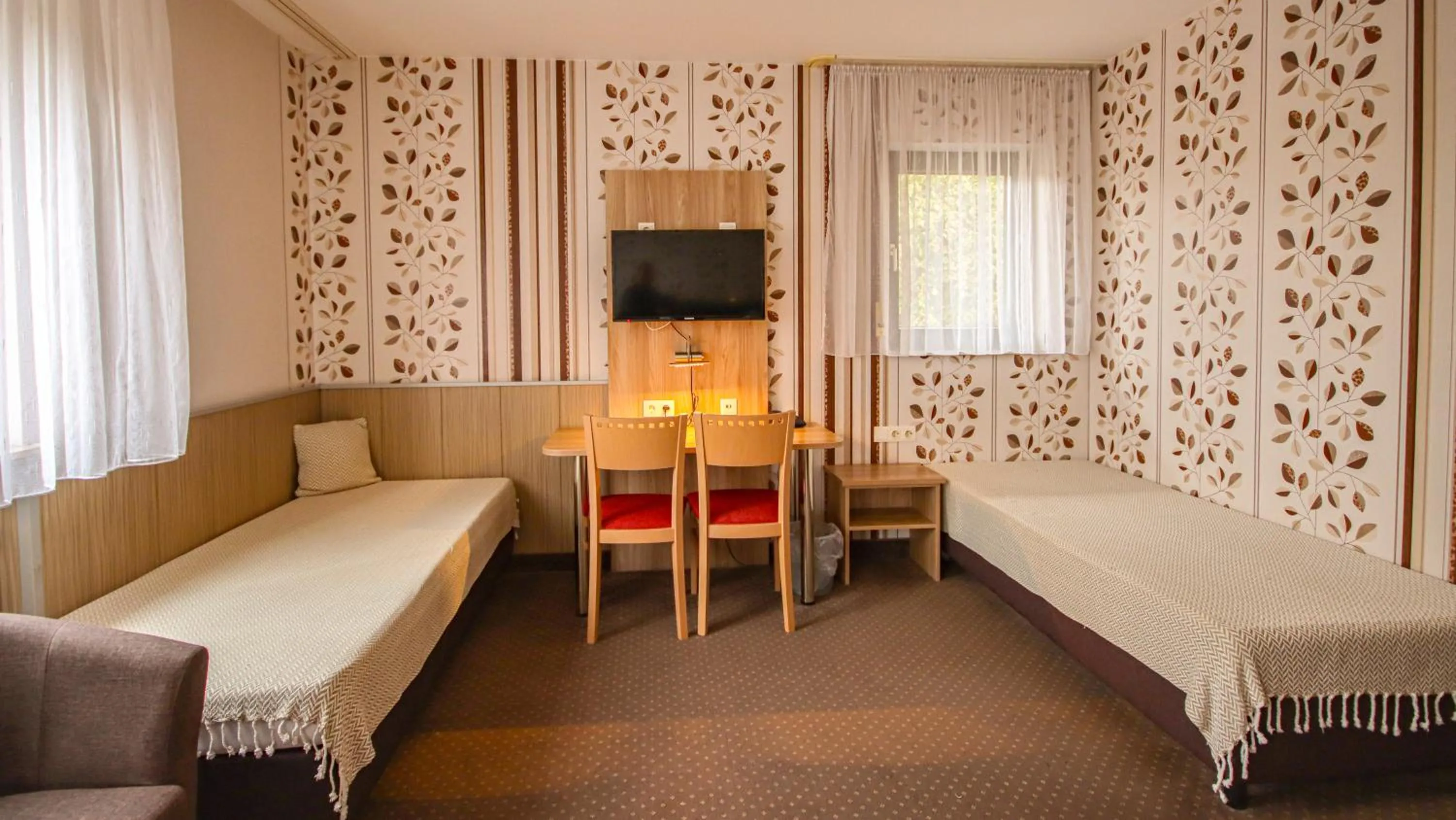 Photo of the whole room, Bed in Hotel Fausel