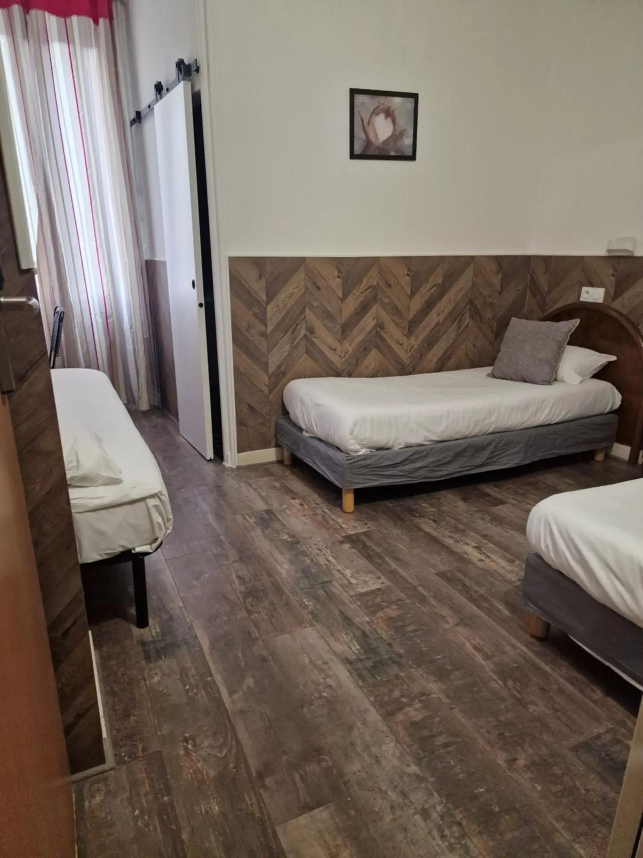 Bed in Hôtel Gloria Bed in Hôtel Gloria