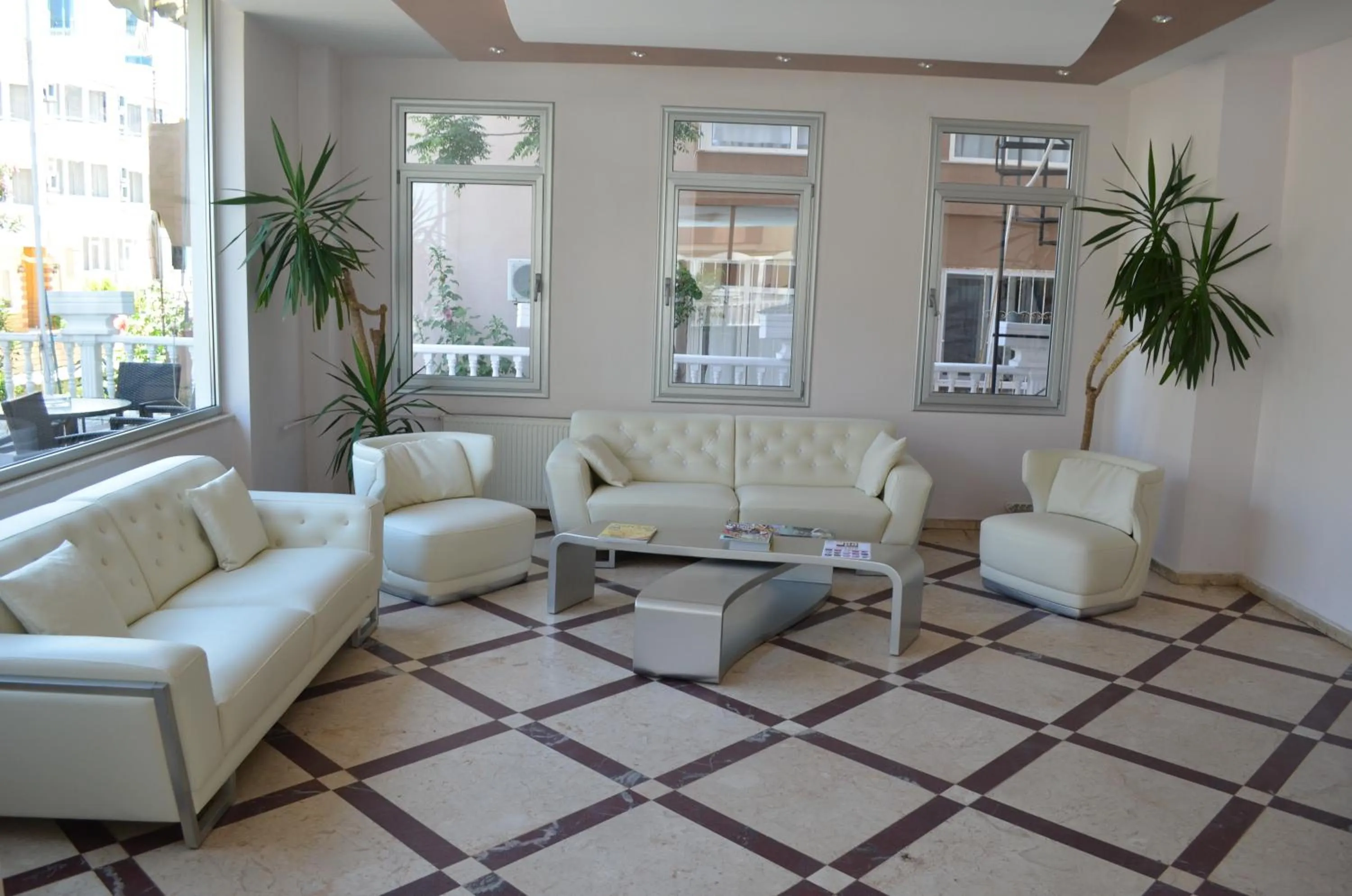 Lobby or reception in Grand Milano Hotel