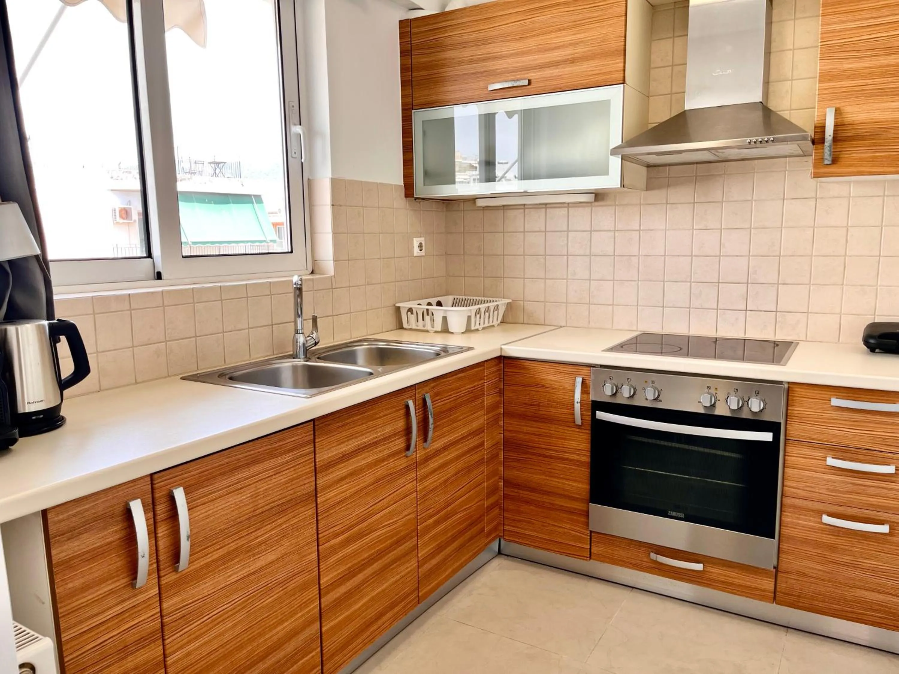 Kitchen or kitchenette in Elvita Apartments 2