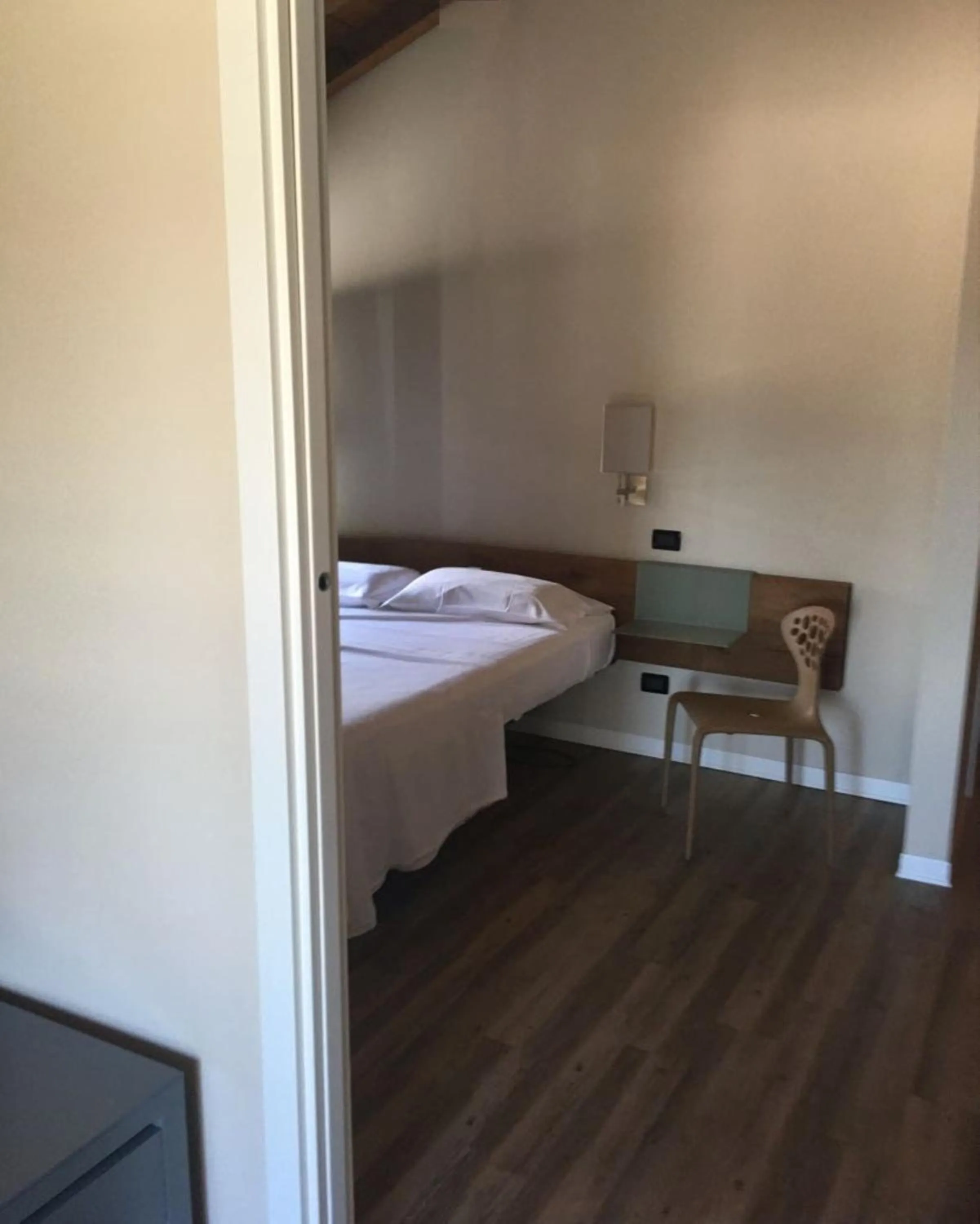 Bed in Corte San Luca Apartments