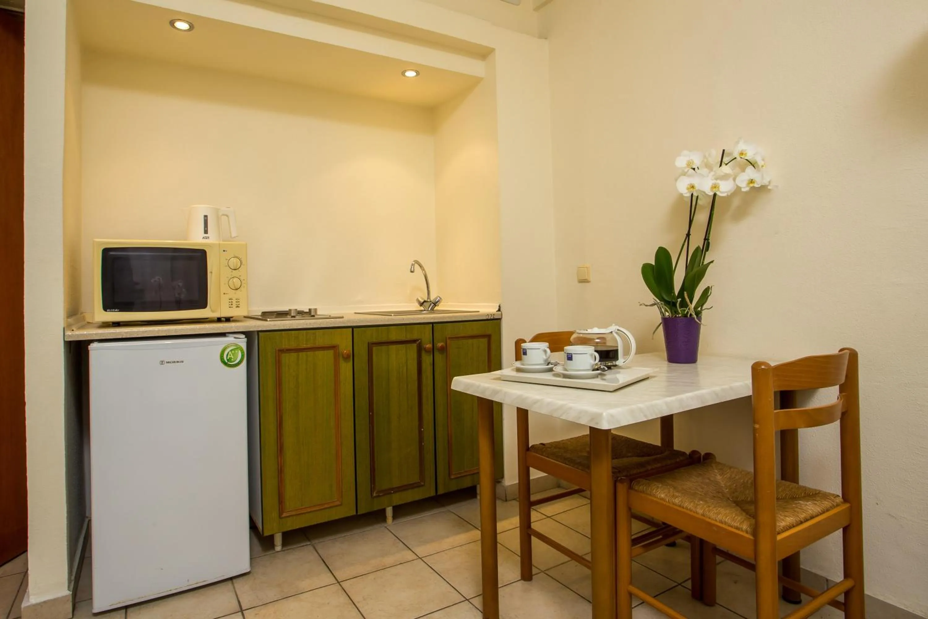 Kitchen or kitchenette in Royal Aparthotel City Centre