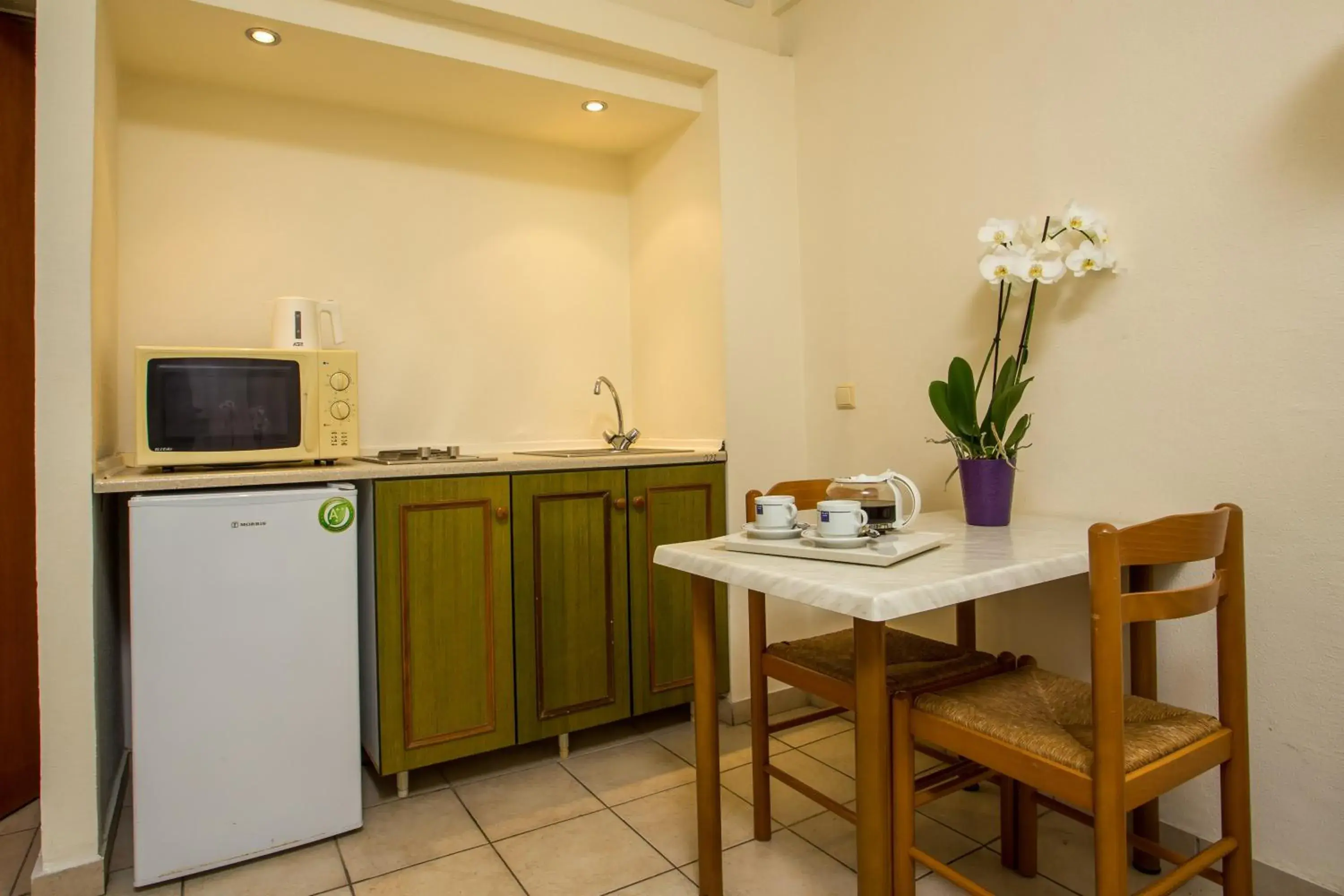 Kitchen or kitchenette in Royal Aparthotel City Centre Kitchen or kitchenette in Royal Aparthotel City Centre