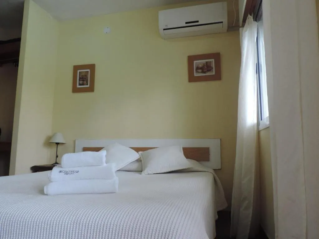 Bed in Casa Di Aqua Apart Hotel