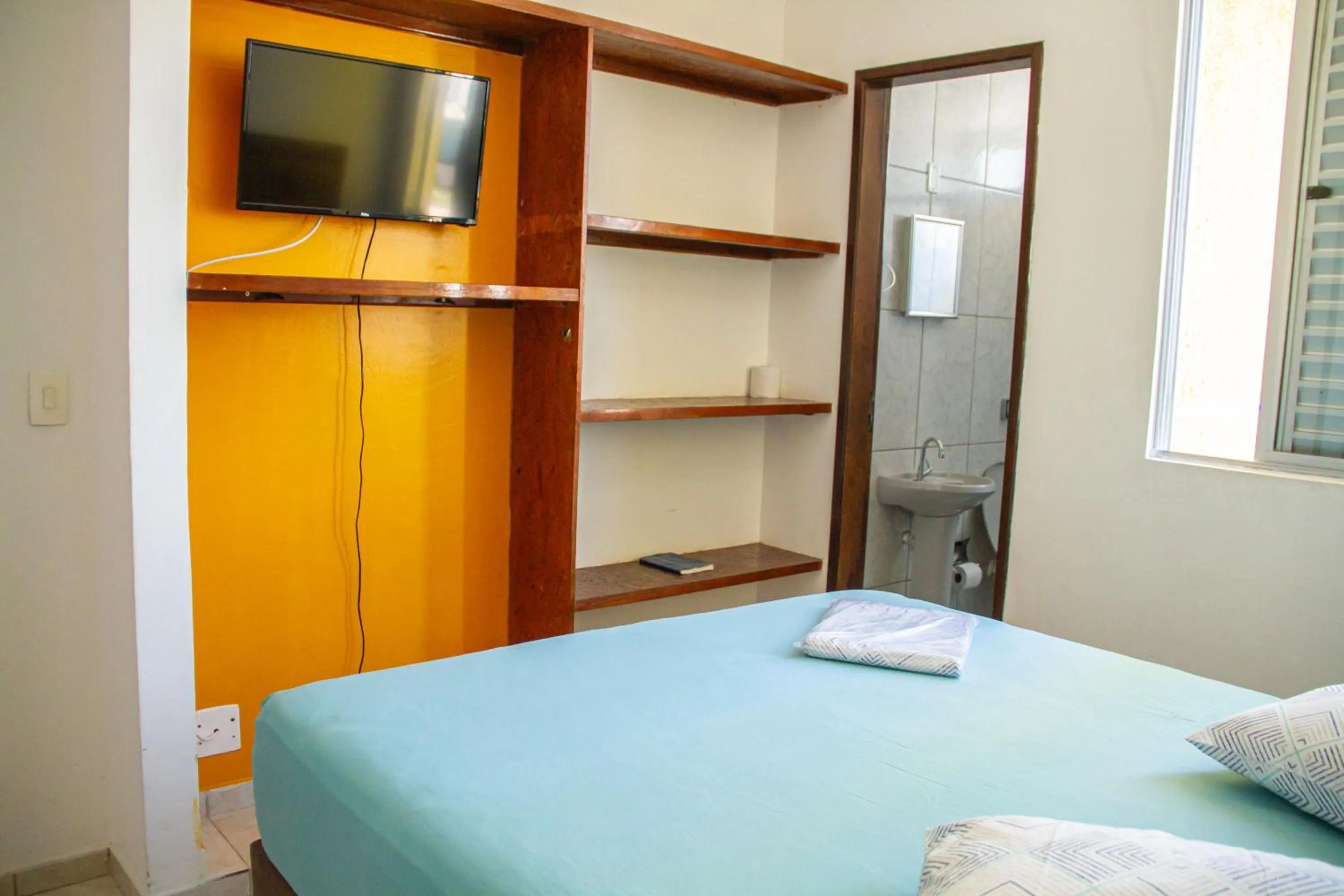 Bed in Pousada Estrela Dourada