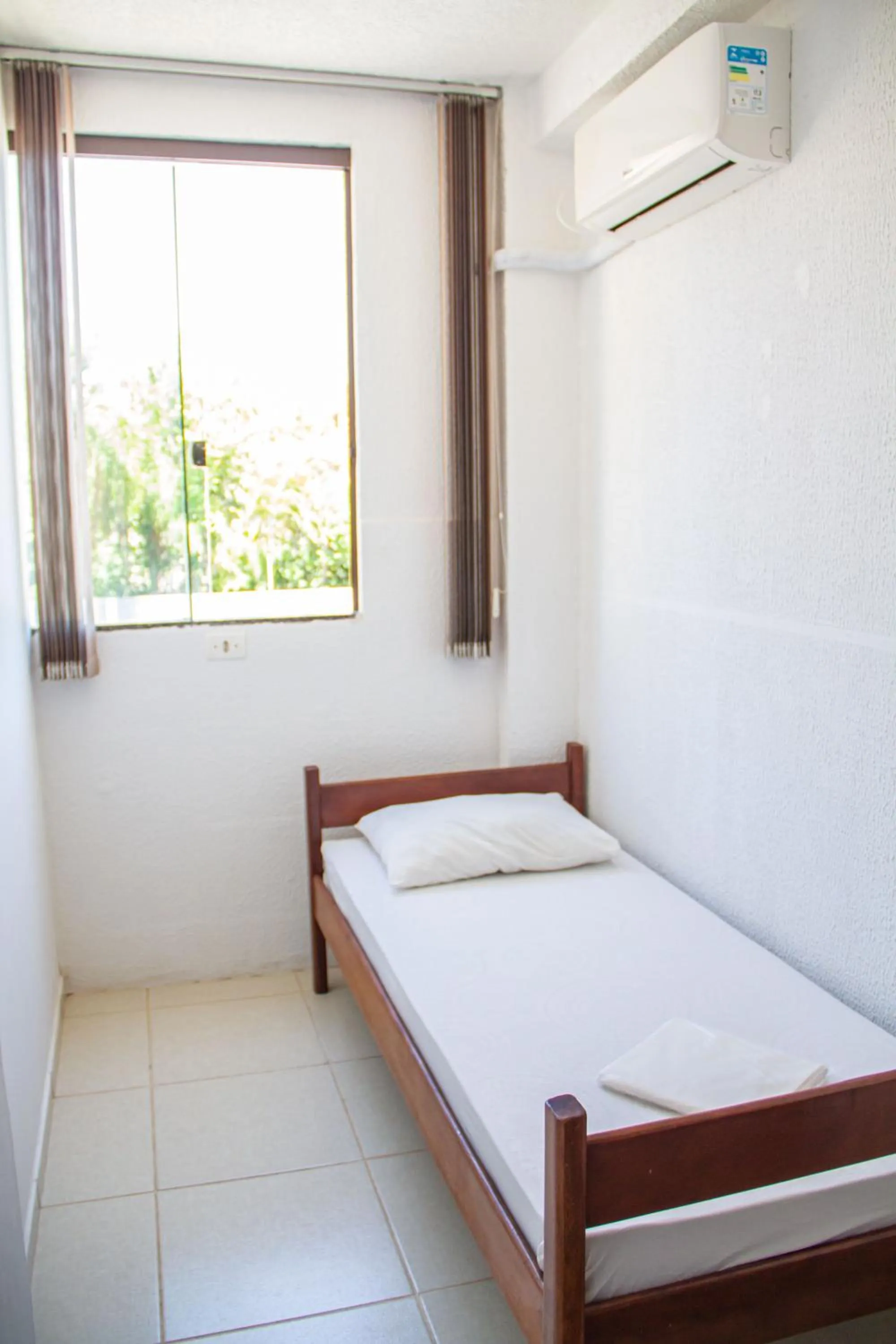 Bed in Pousada Estrela Dourada