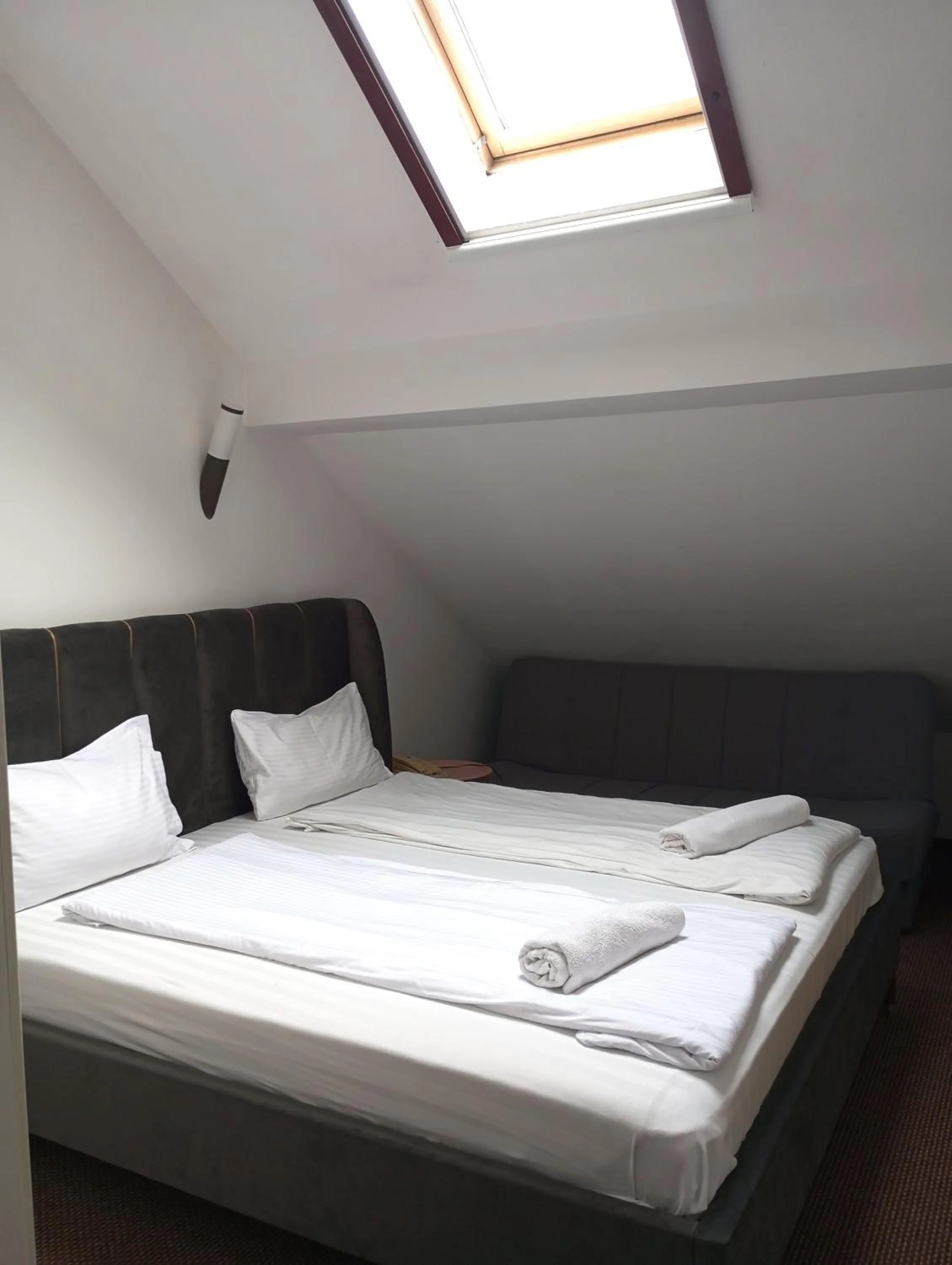 Attic Classic Triple Room  in RHC Royal Hotel
