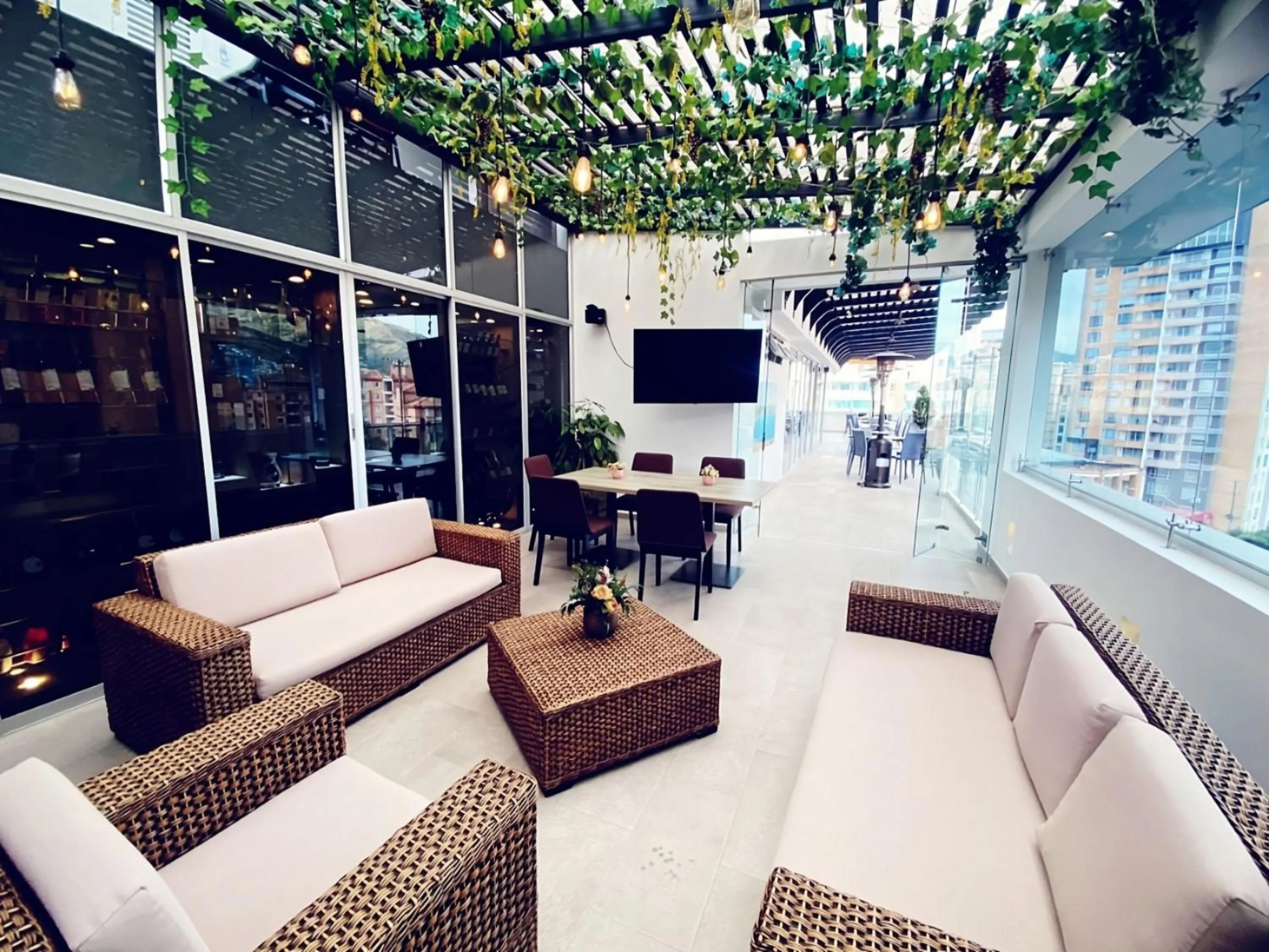 Communal lounge/ TV room in San Juan Hotel Boutique Pasto