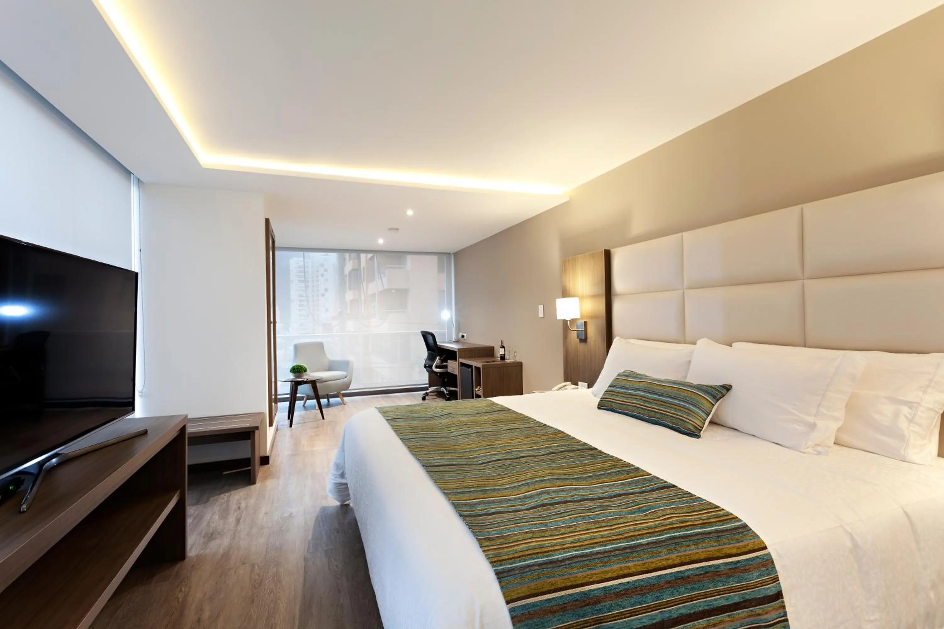 Photo of the whole room, Bed in San Juan Hotel Boutique Pasto