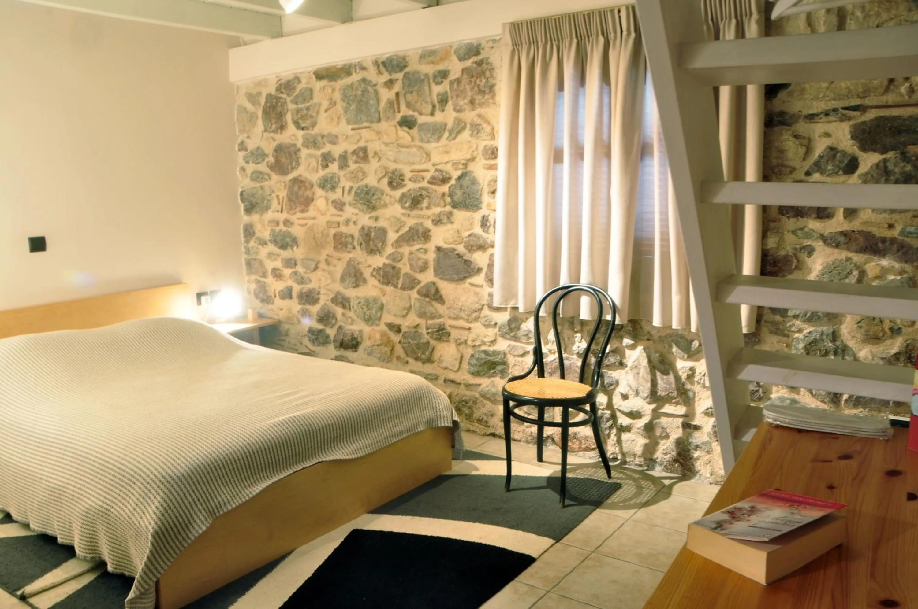 Bed in Limni Stone Apartments