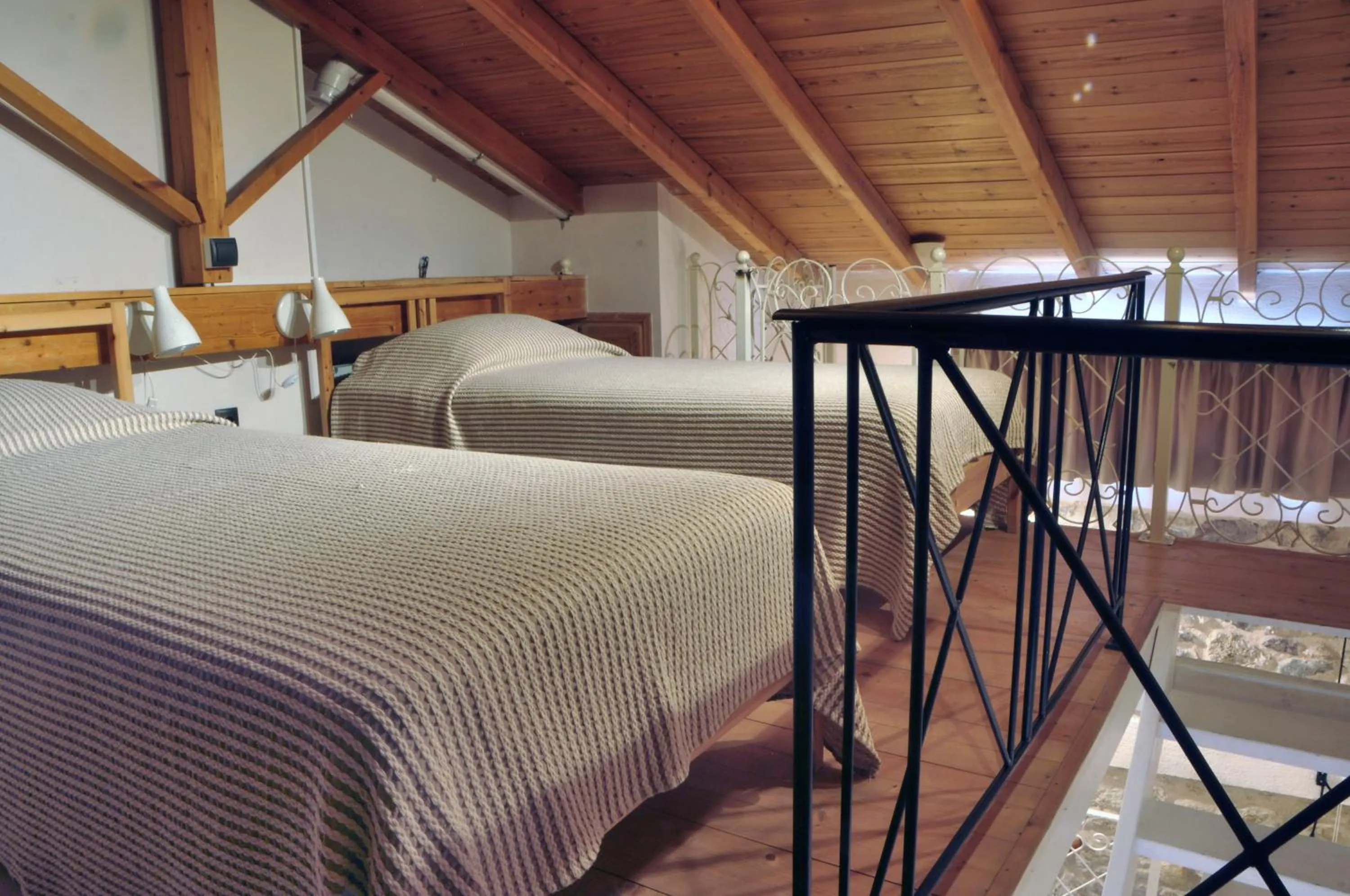 Bed in Limni Stone Apartments