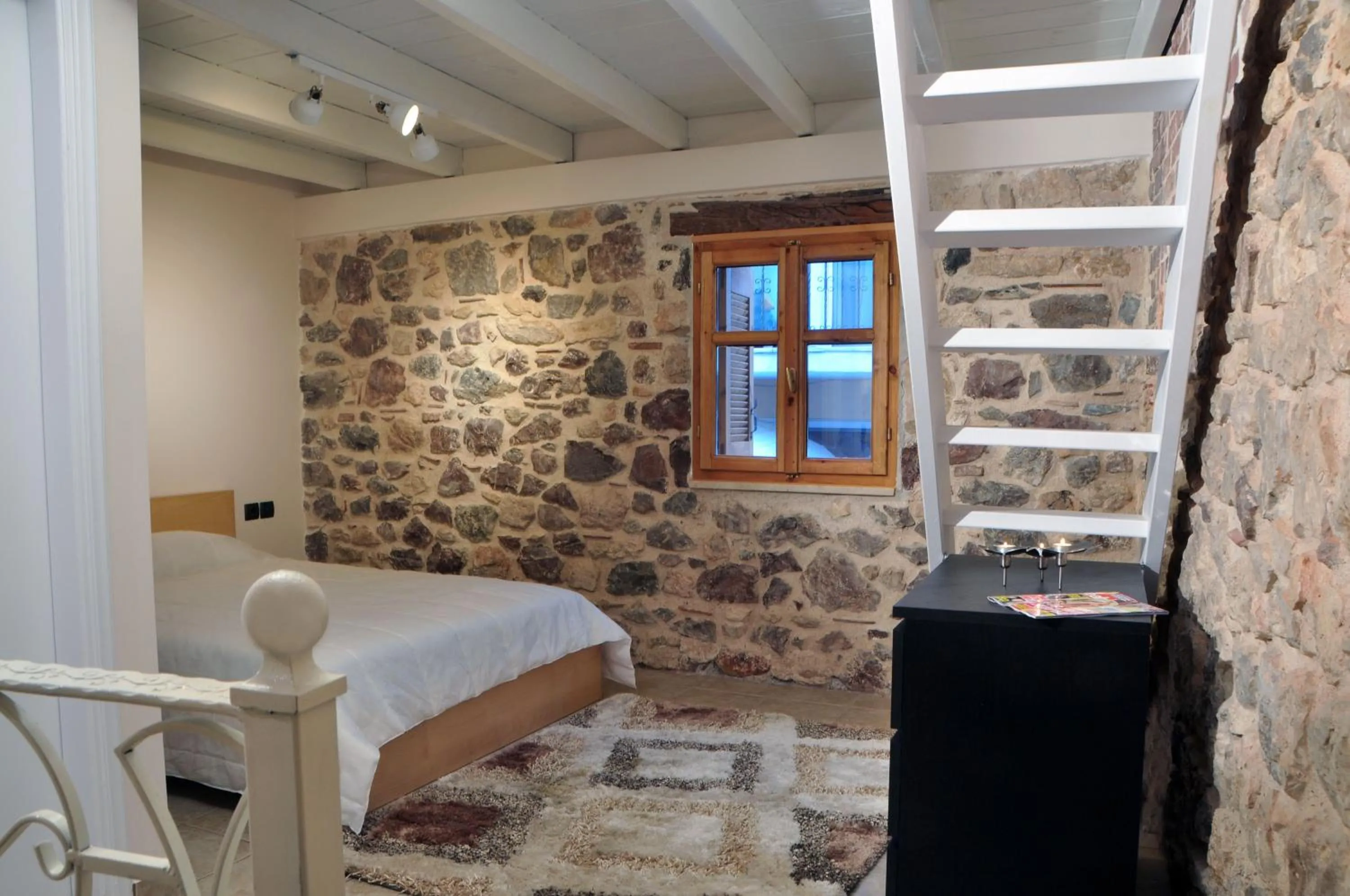 Bed in Limni Stone Apartments