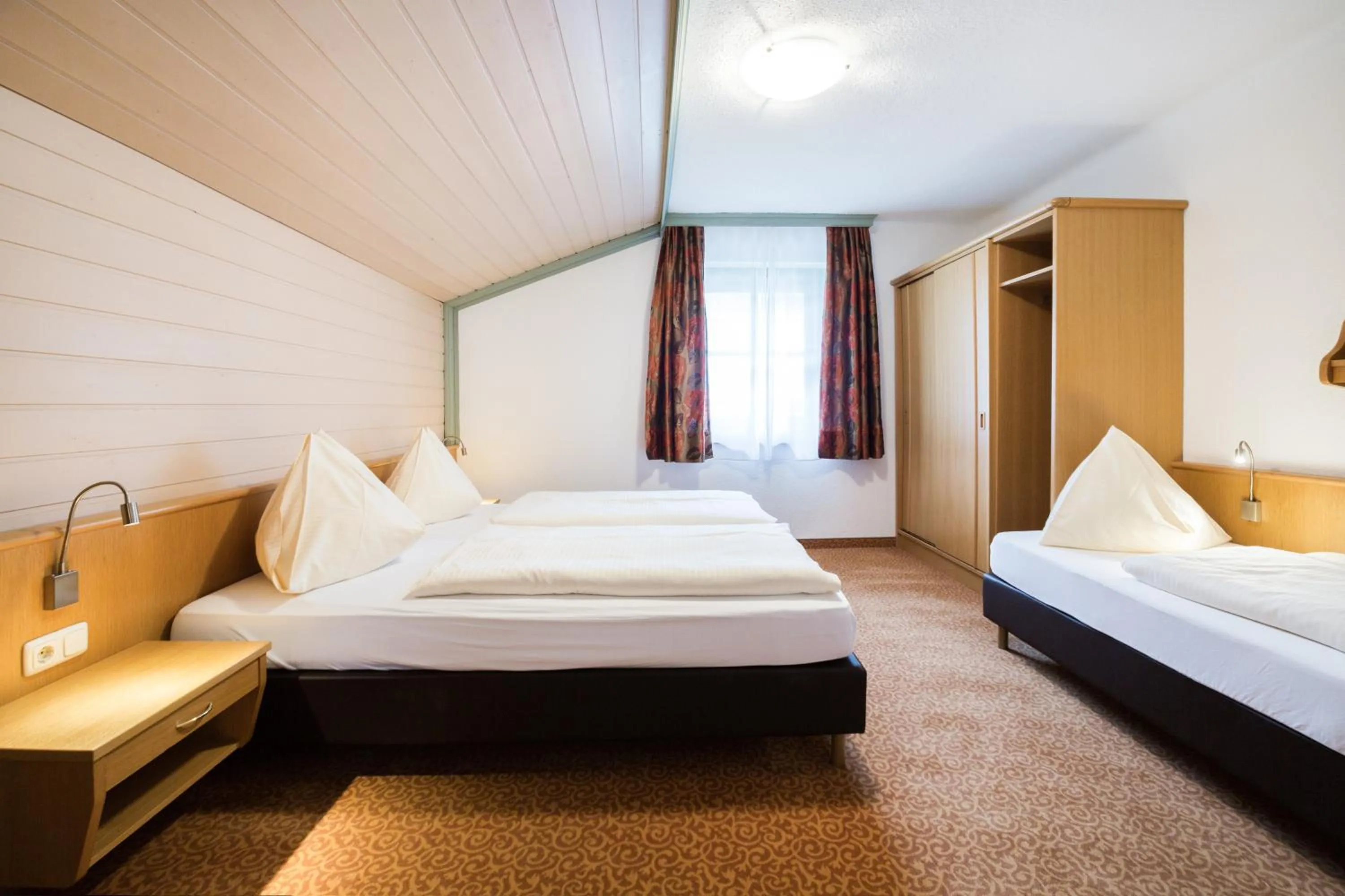 Bed in Appartements Tannenhof