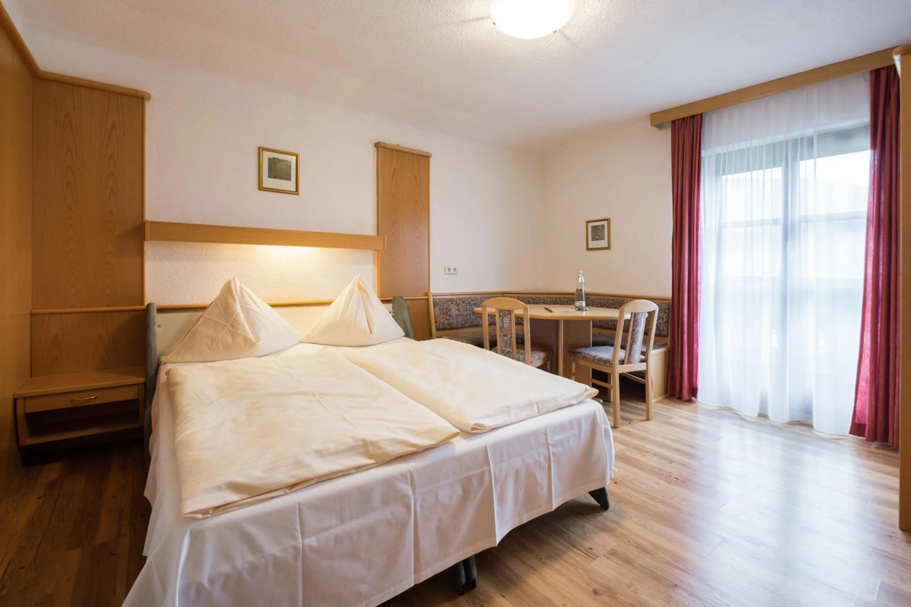 Bed in Appartements Tannenhof