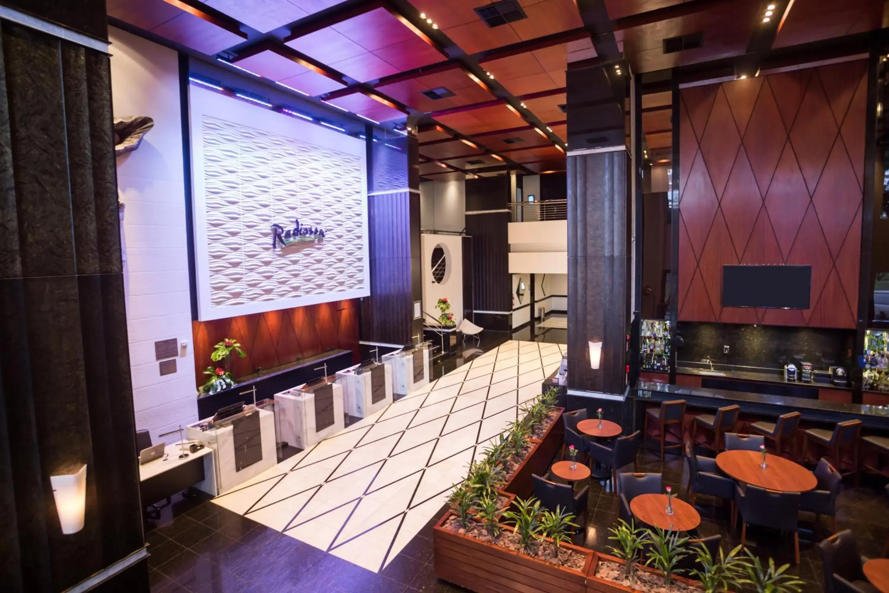 Lobby or reception in Radisson Hotel Curitiba Lobby or reception in Radisson Hotel Curitiba