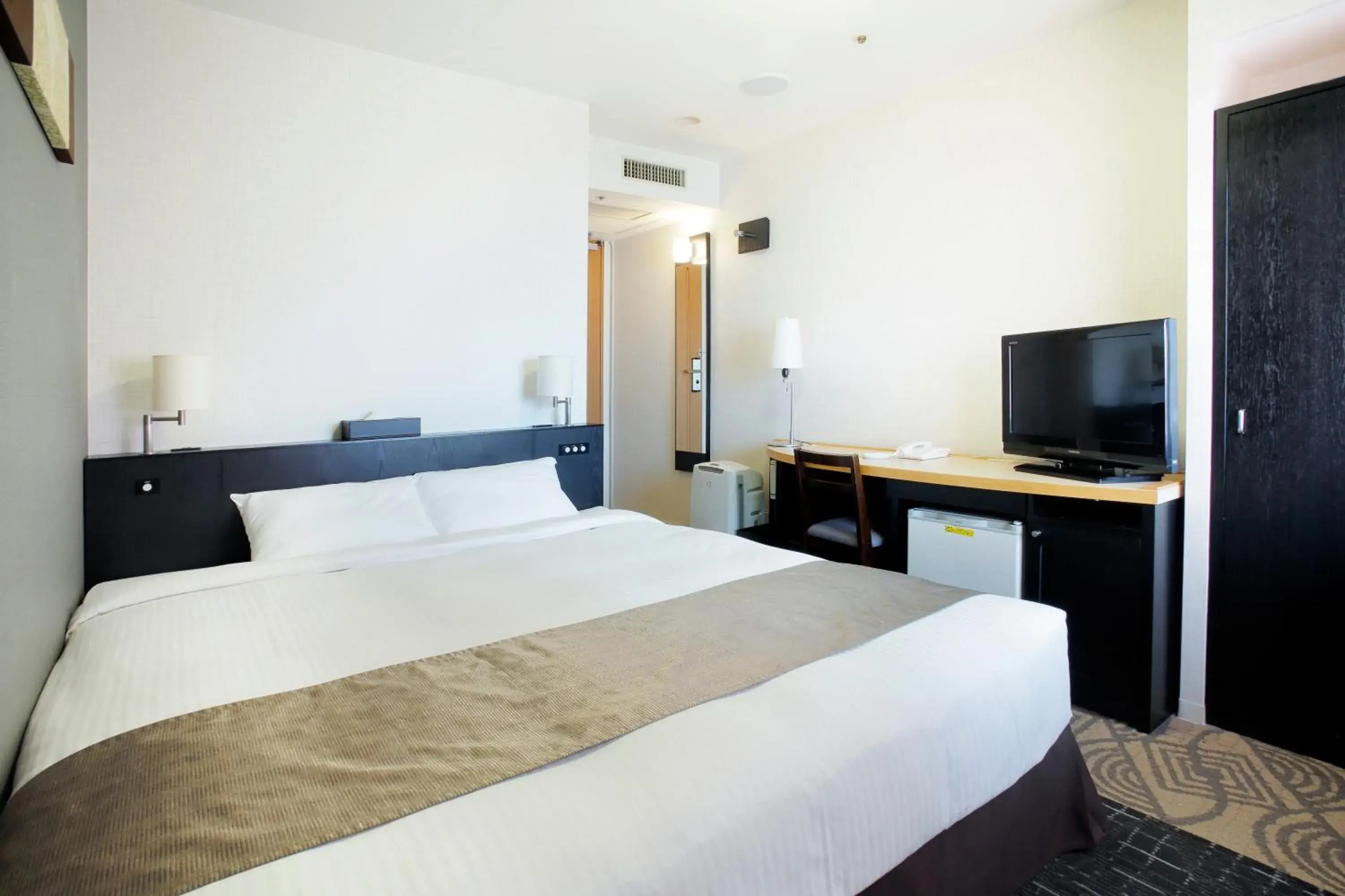 Photo of the whole room, Bed in Sapporo Tokyu REI Hotel Photo of the whole room, Bed in Sapporo Tokyu REI Hotel