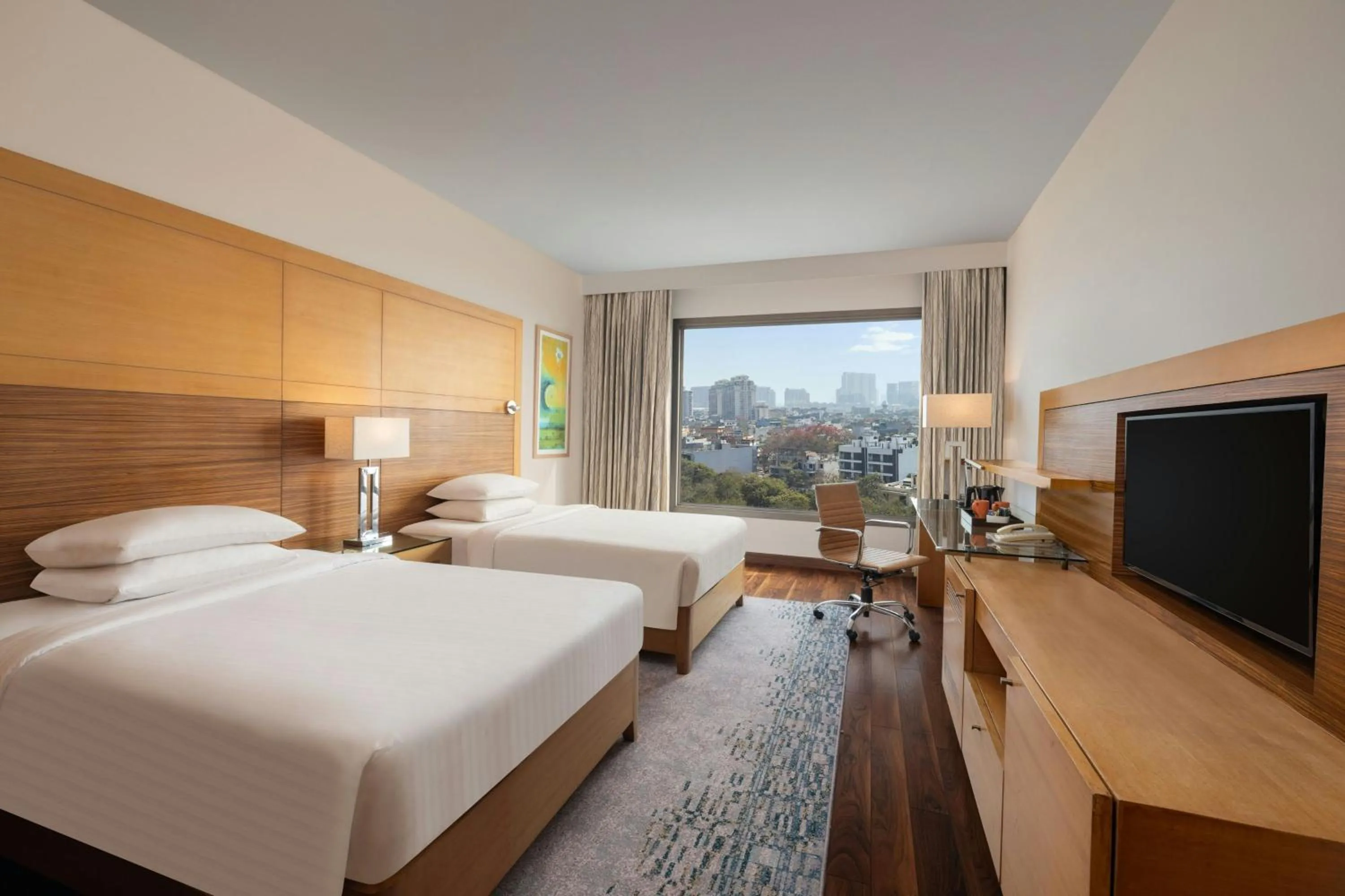 Photo of the whole room, Bed in Courtyard by Marriott Gurugram Downtown