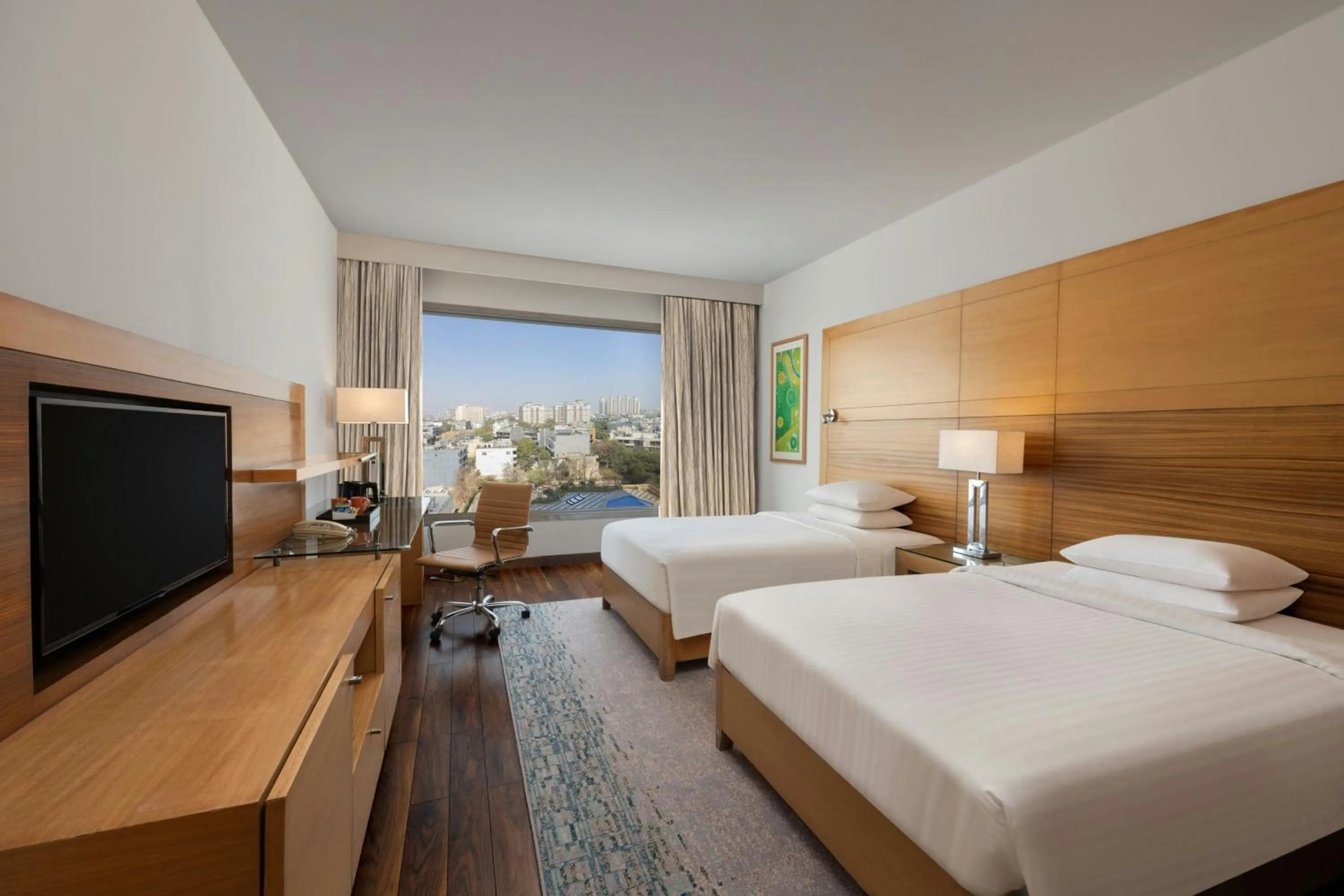 Swimming pool, Bed in Courtyard by Marriott Gurugram Downtown