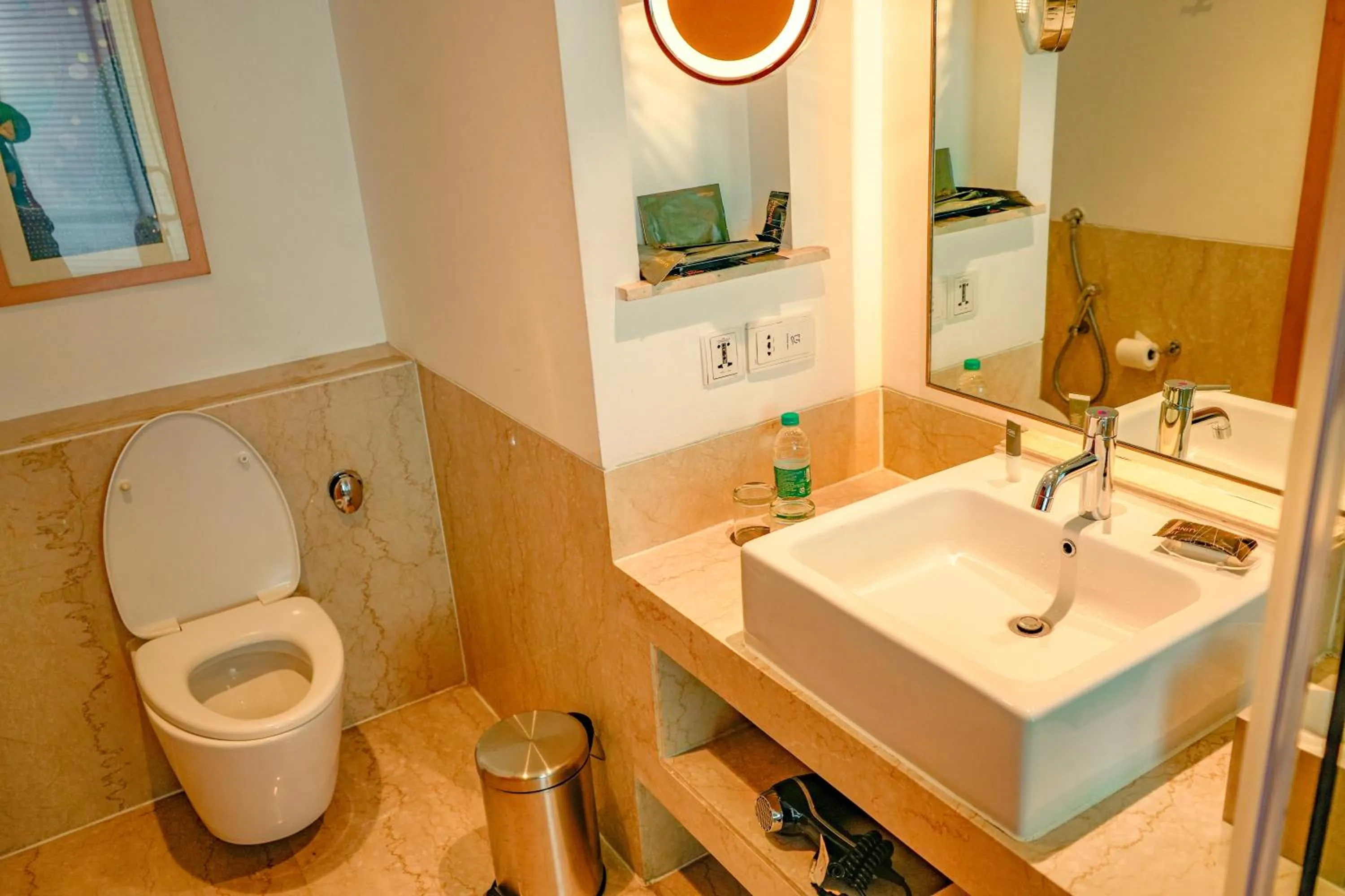Toilet in Courtyard by Marriott Gurugram Downtown