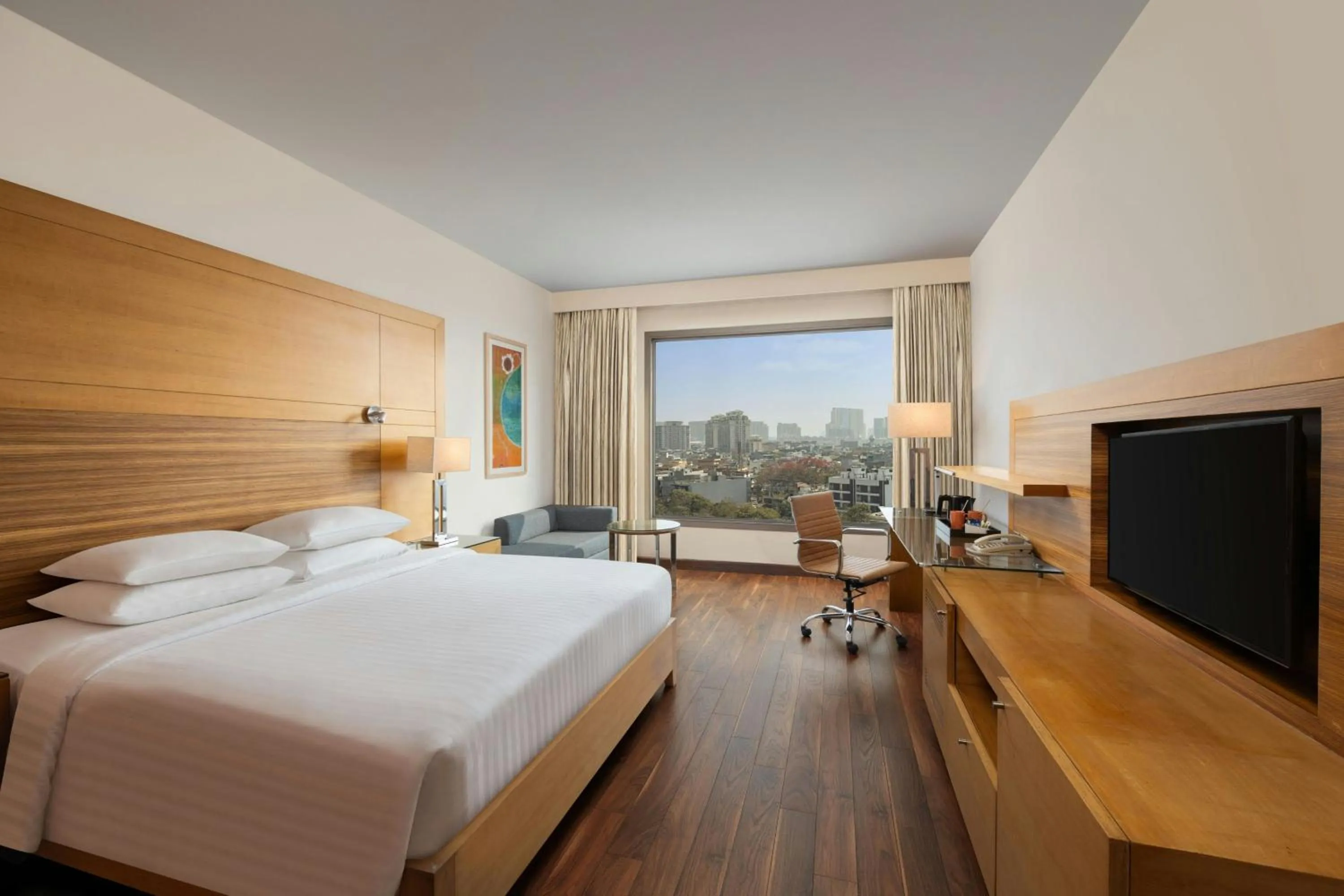 Photo of the whole room, Bed in Courtyard by Marriott Gurugram Downtown